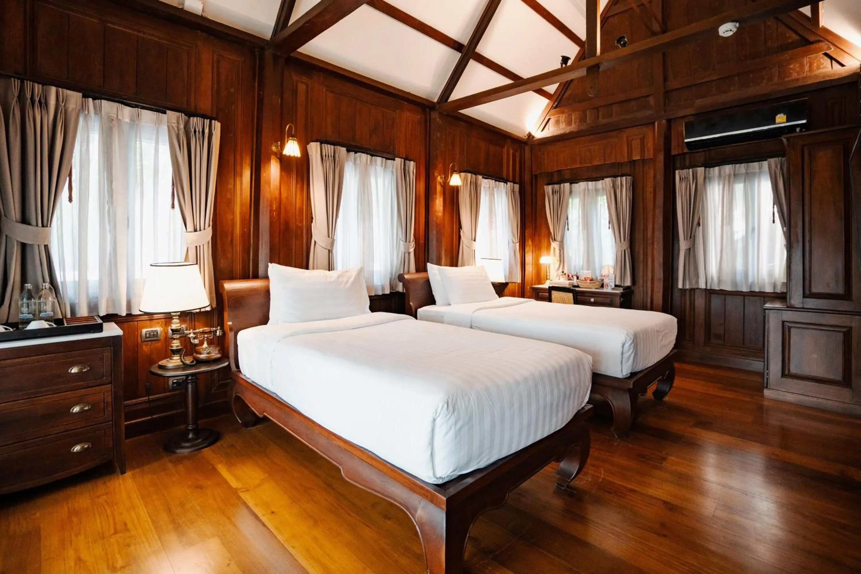 Bed in Buri Sriping Riverside Resort & Spa
