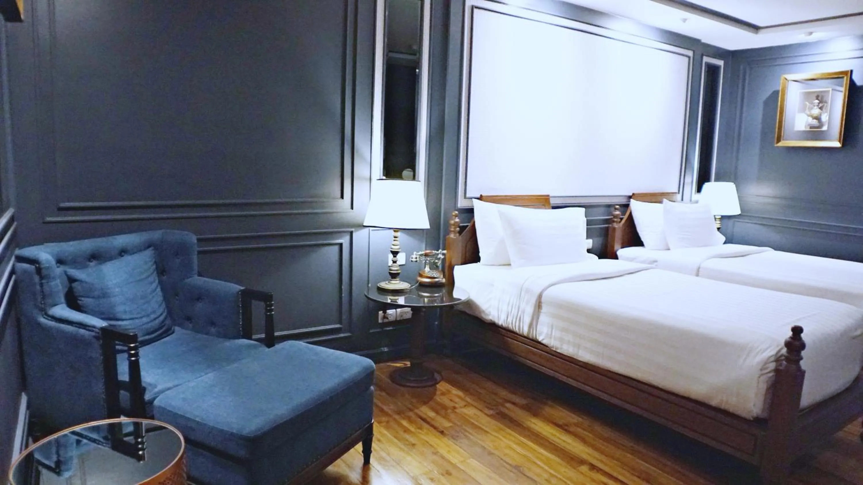 Bed in Buri Sriping Riverside Resort & Spa