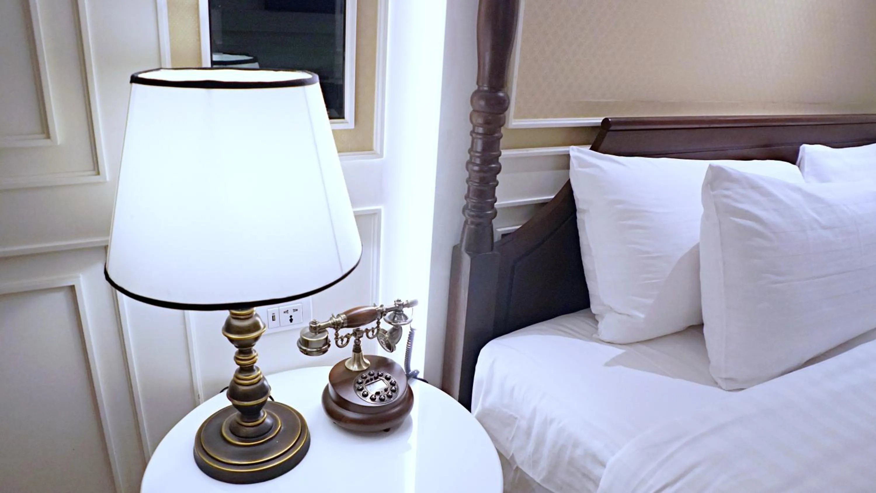 Bed in Buri Sriping Riverside Resort & Spa