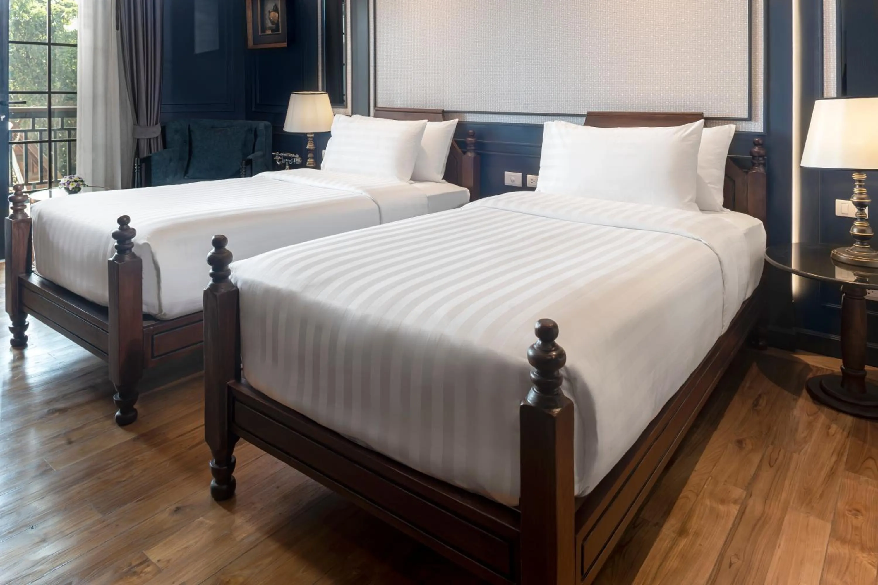 Bed in Buri Sriping Riverside Resort & Spa