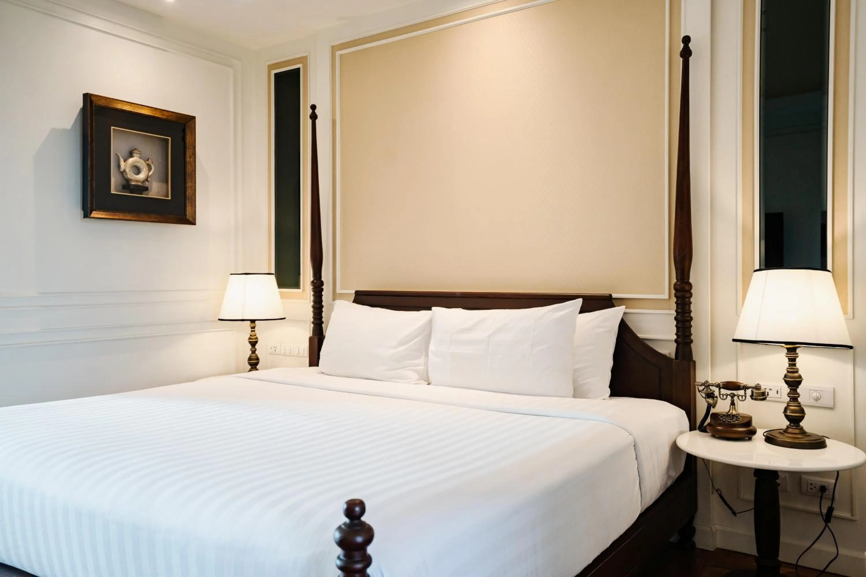 Bed in Buri Sriping Riverside Resort & Spa