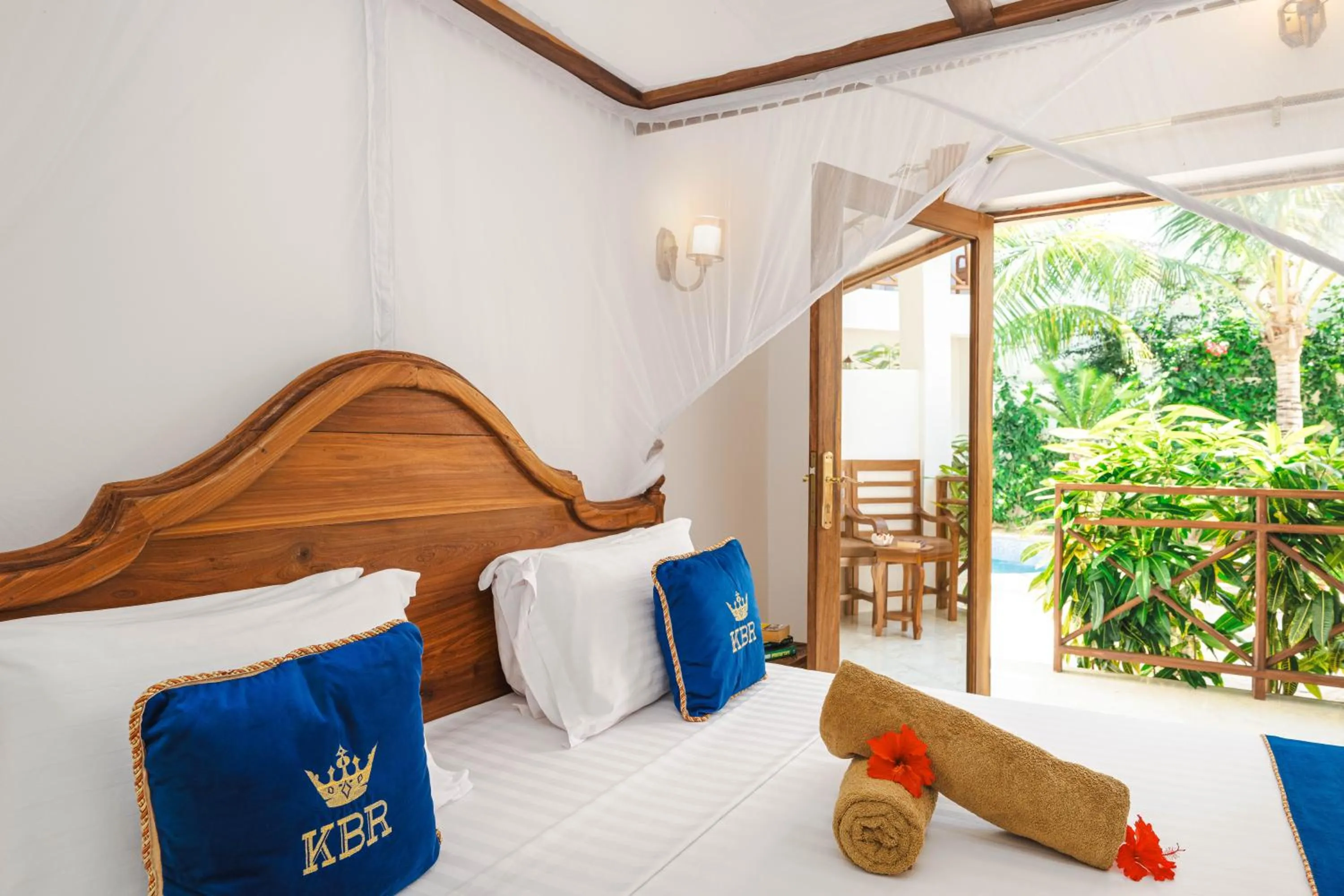 Photo of the whole room, Bed in Karibu Beach Resort