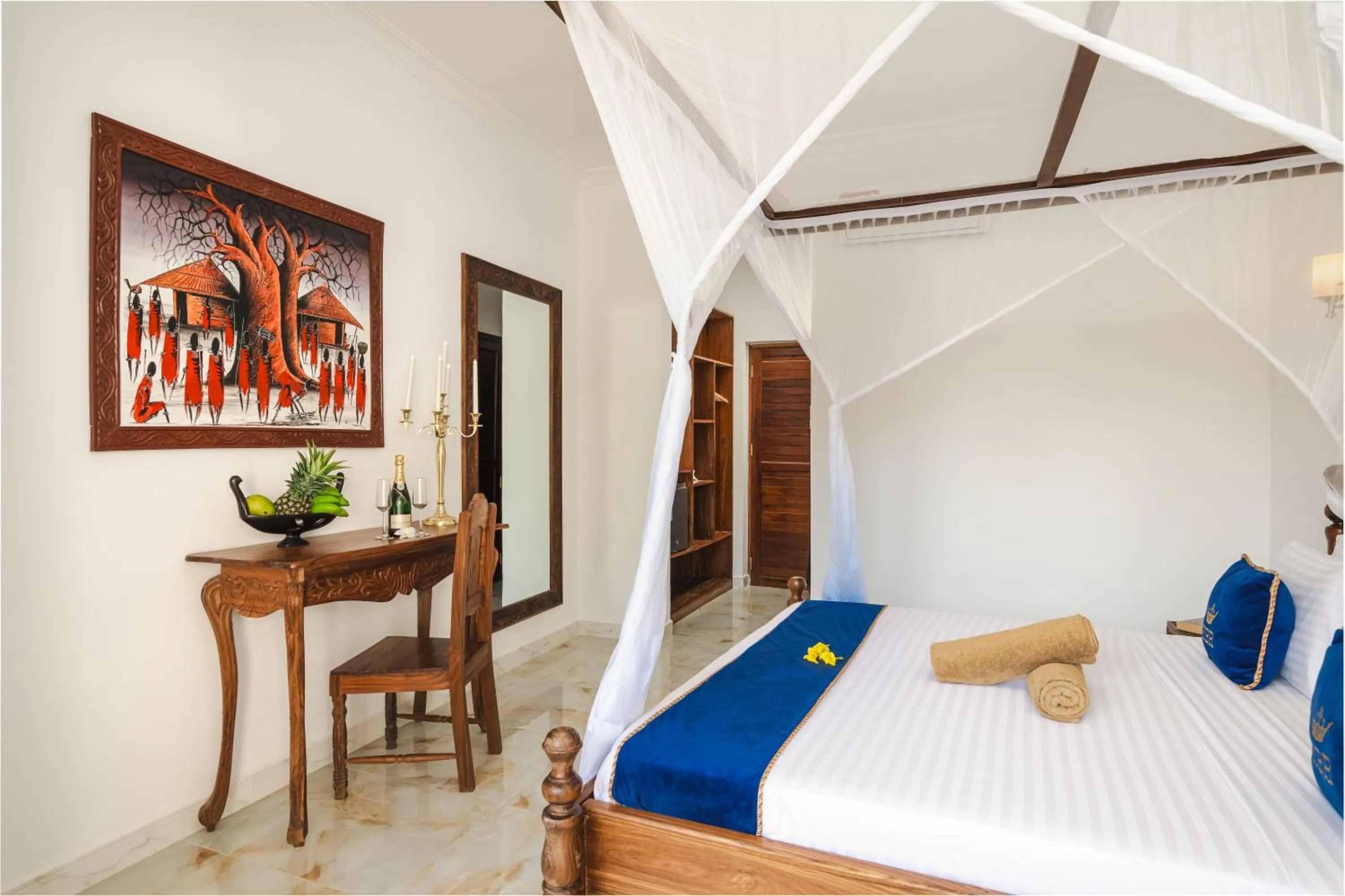 Bed in Karibu Beach Resort