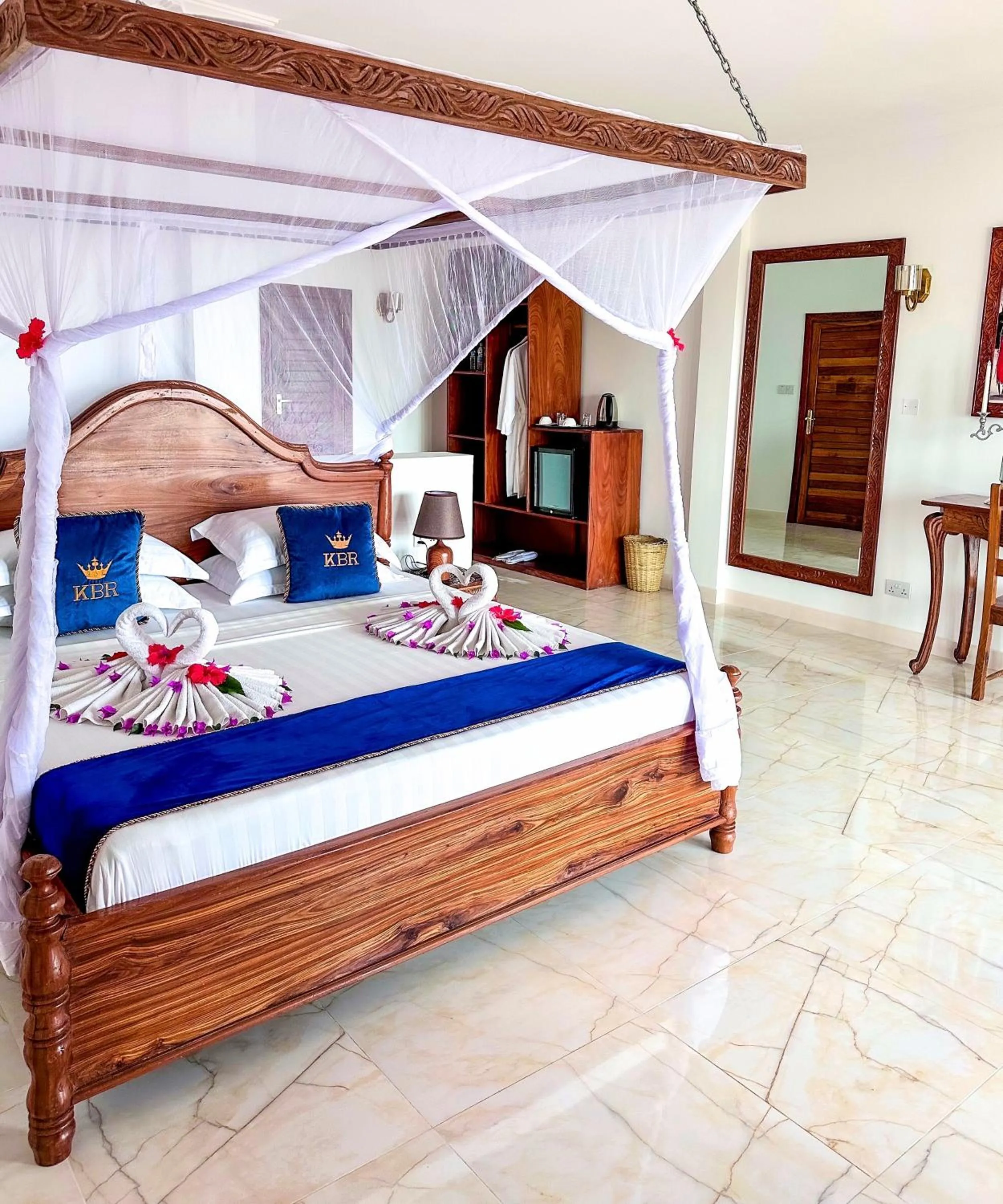 Patio, Bed in Karibu Beach Resort