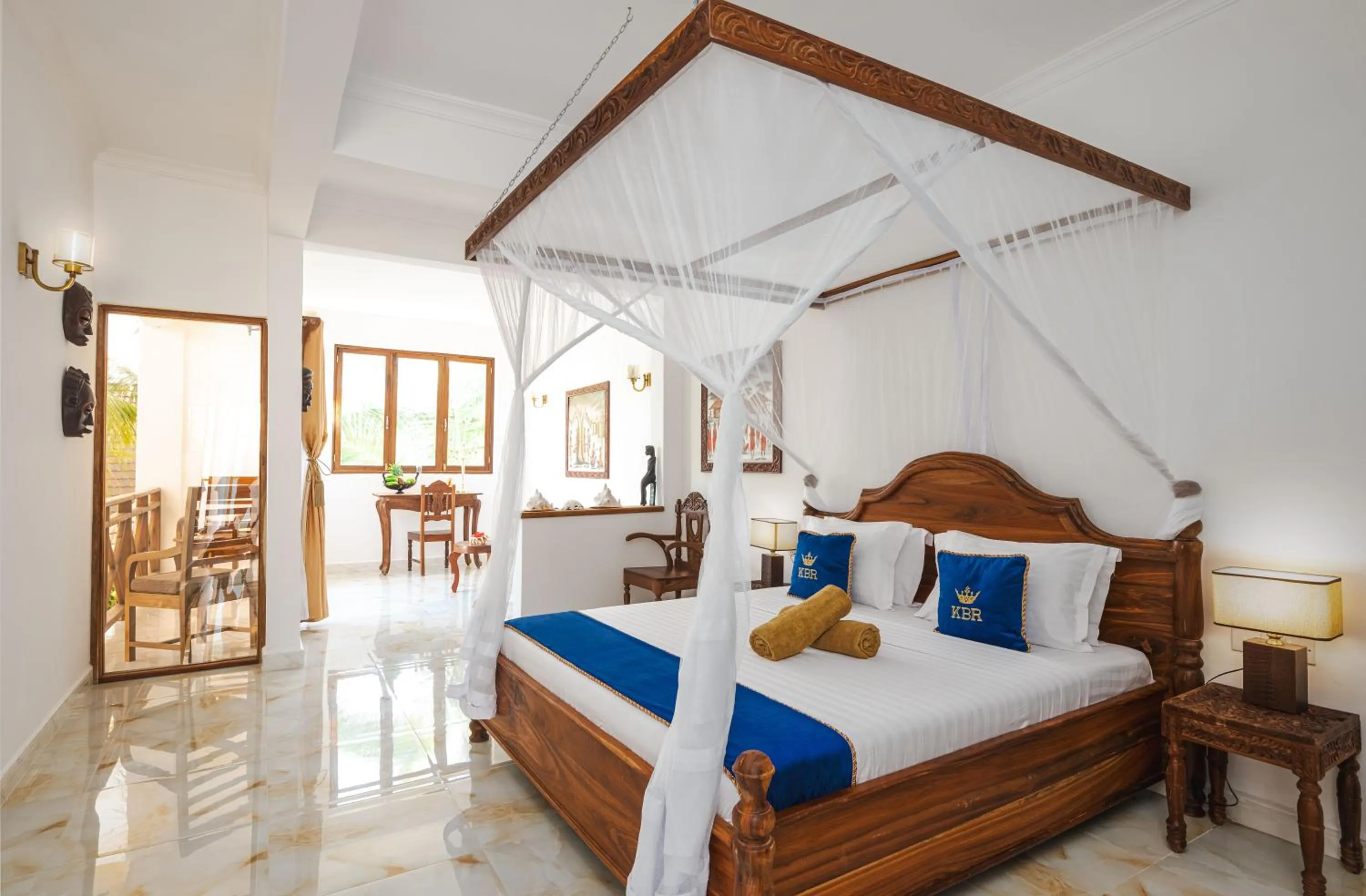 Bed in Karibu Beach Resort