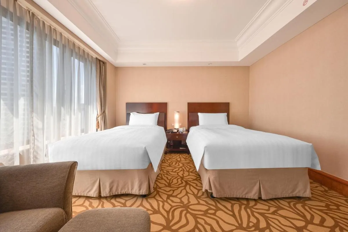 Bed in Furama Hotel Dalian