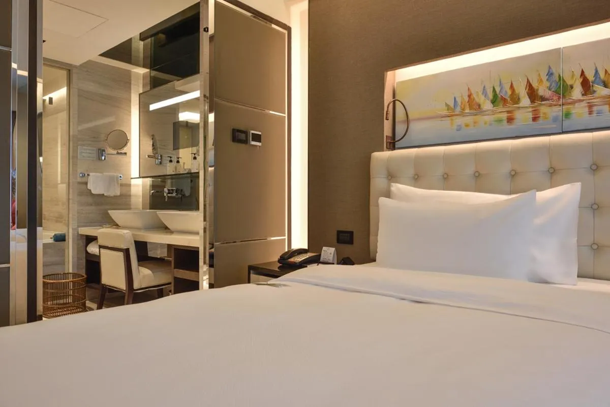 Bed in Furama Hotel Dalian