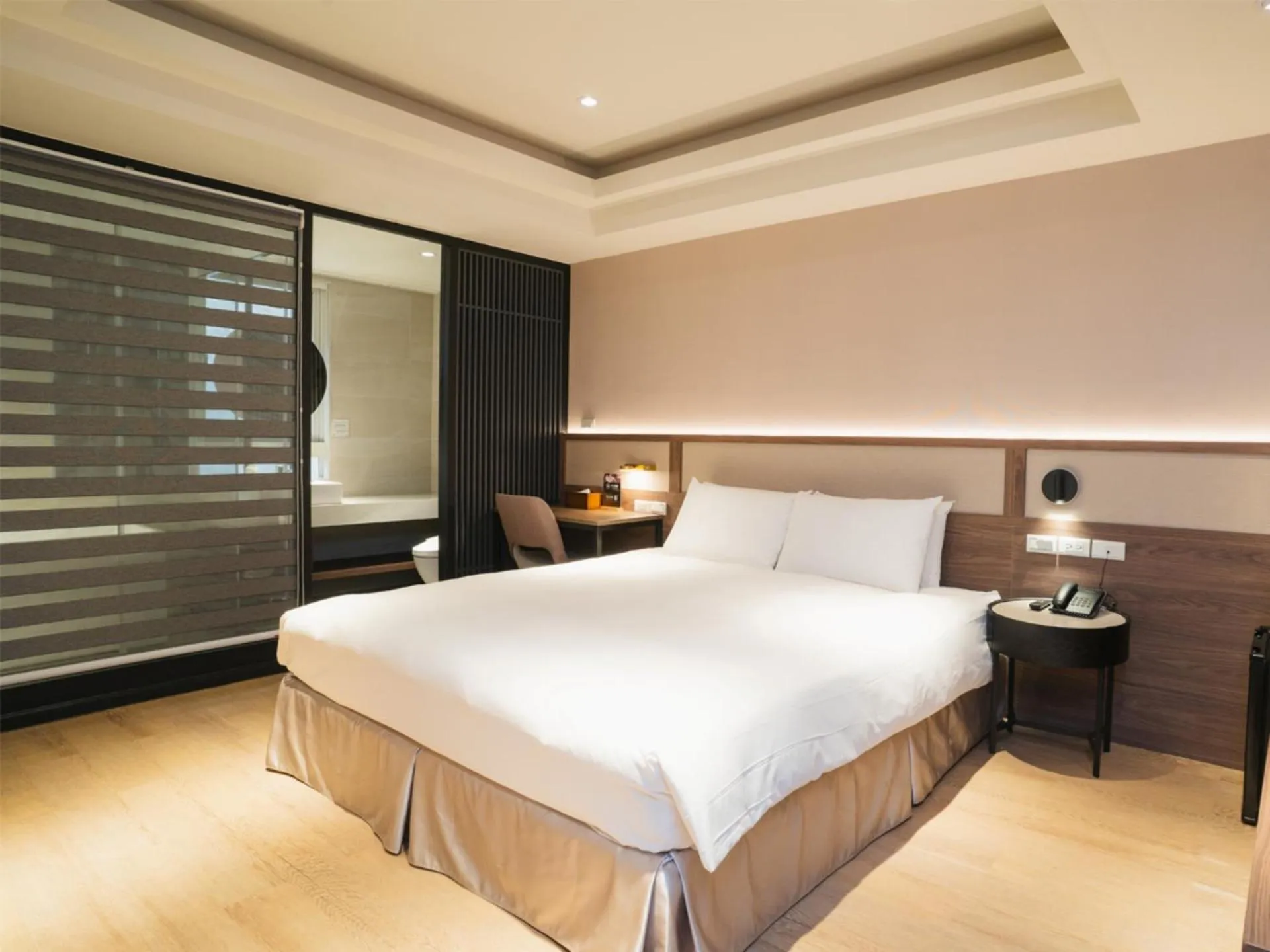 Bed in Royal Rose Hotel Zhongshan