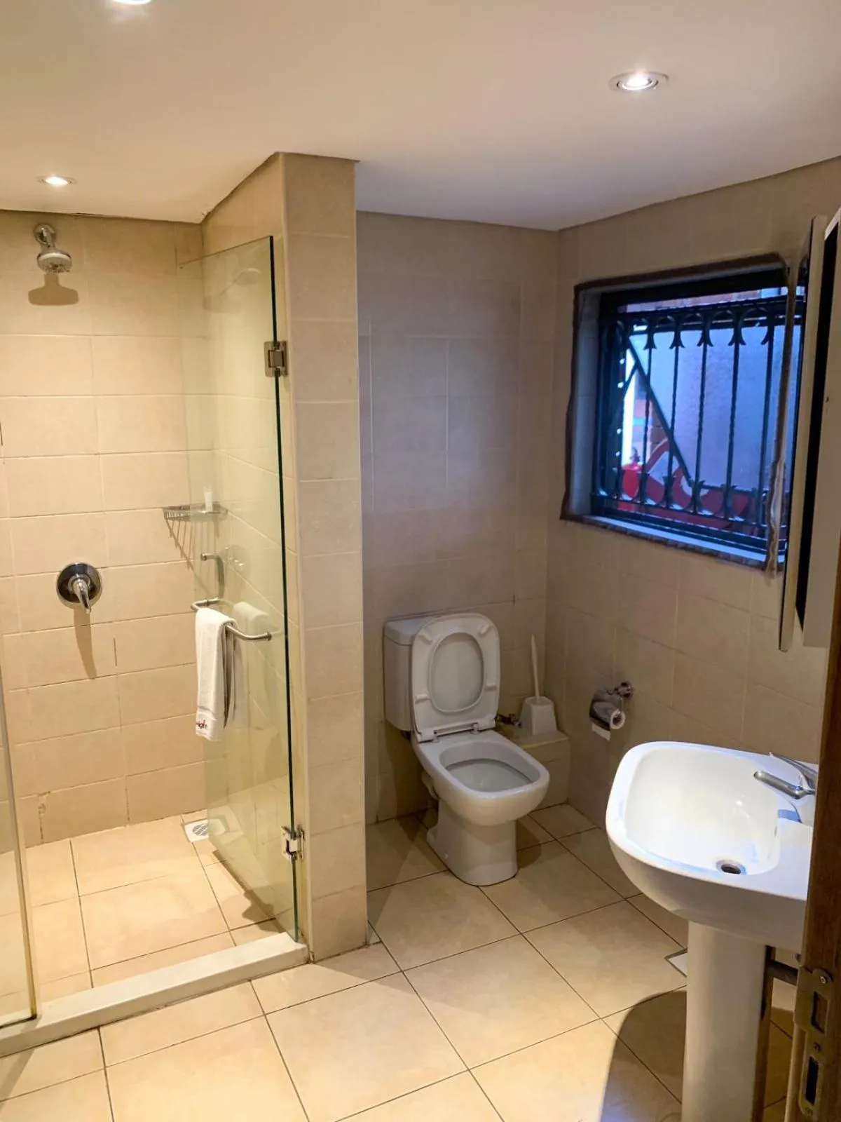 Toilet in Heri Heights Hotel Apartments, SureStay Collection by Best Western