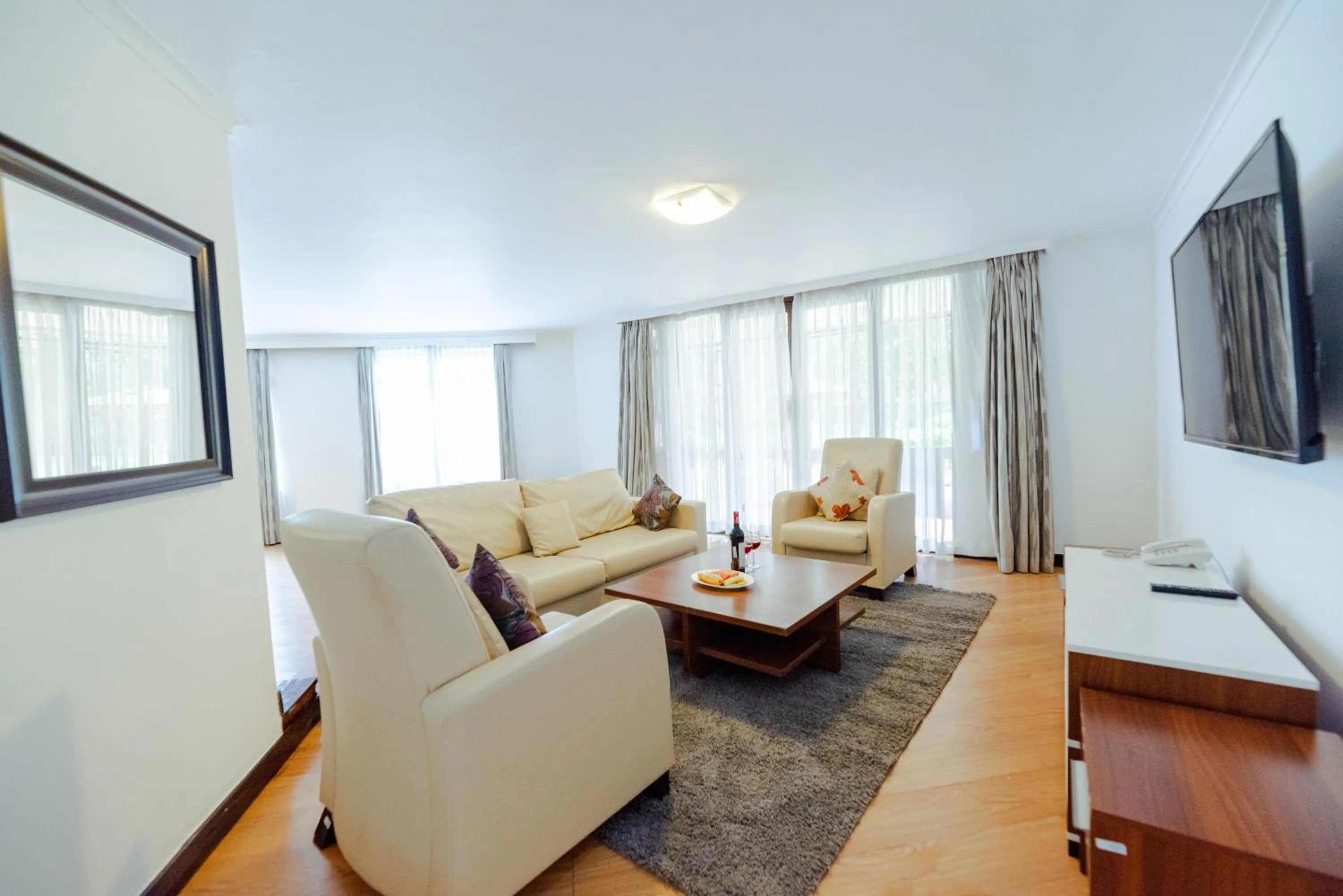 Living room in Heri Heights Hotel Apartments, SureStay Collection by Best Western