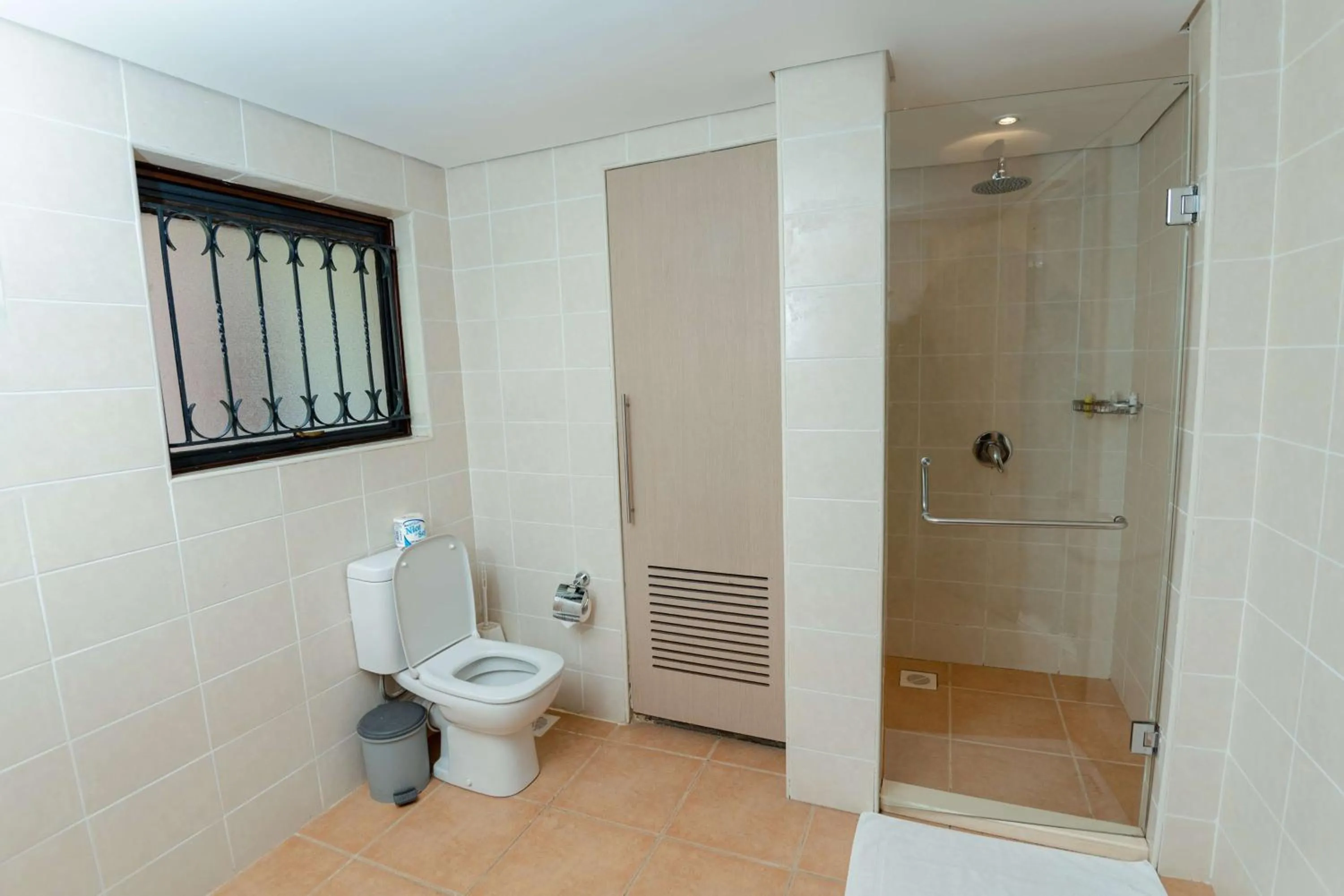 Bathroom in Heri Heights Hotel Apartments, SureStay Collection by Best Western