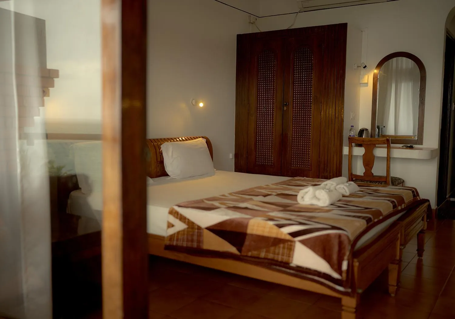 Bed in Vijaya Varma Beach Resort
