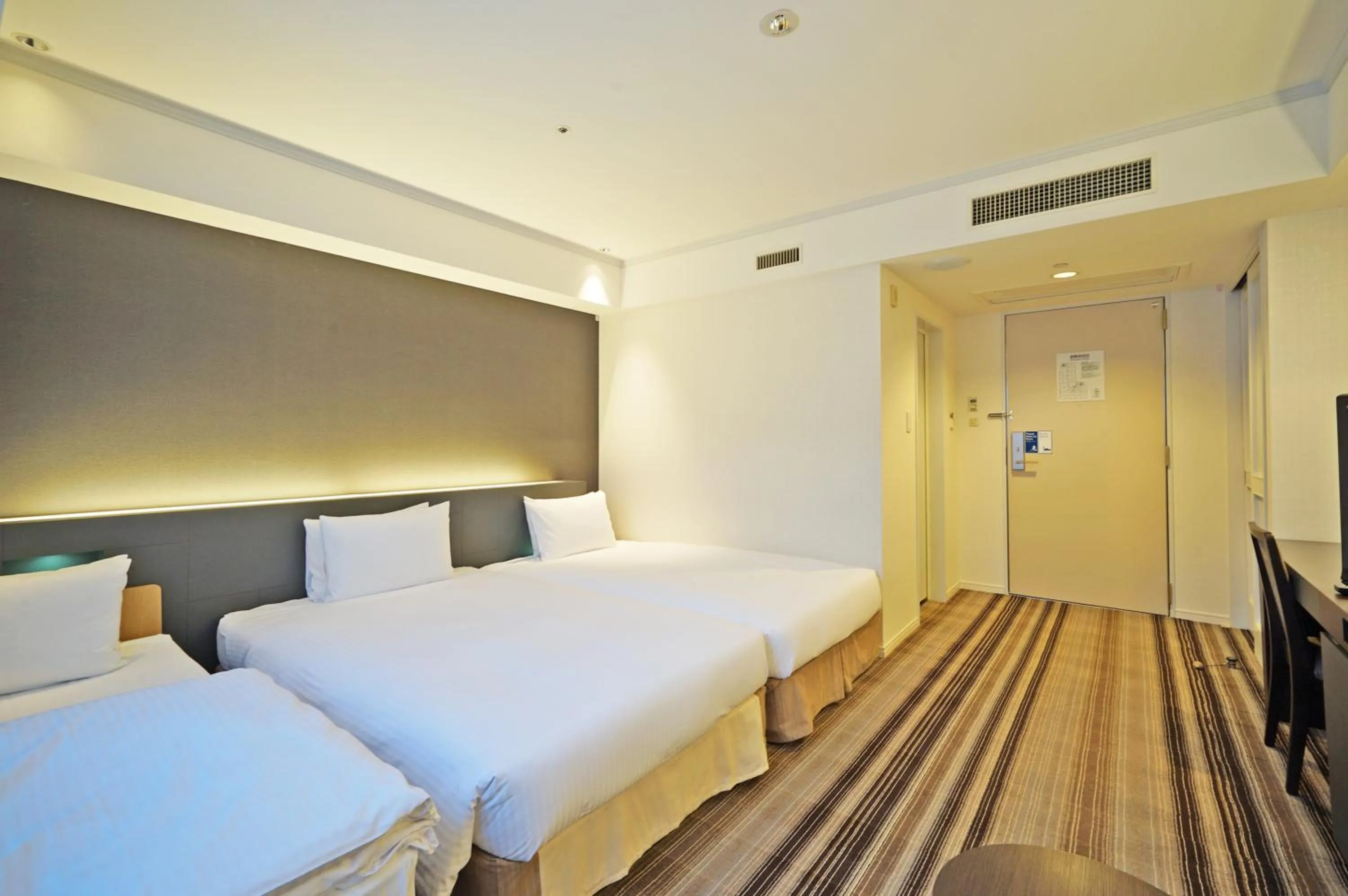 Bed in Chisun Grand Takayama