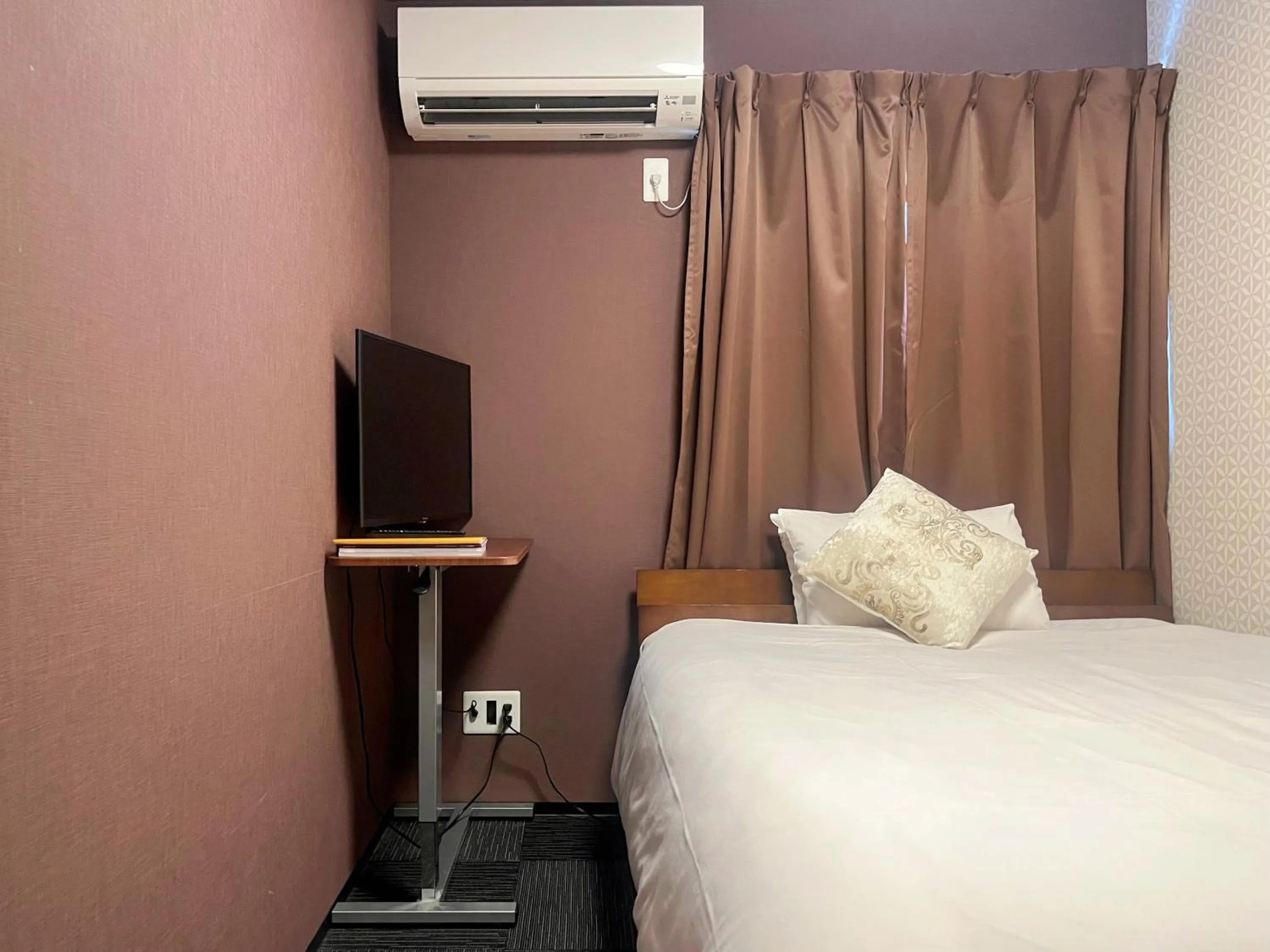 Bed in Miro Kyoto Nijo Hotel