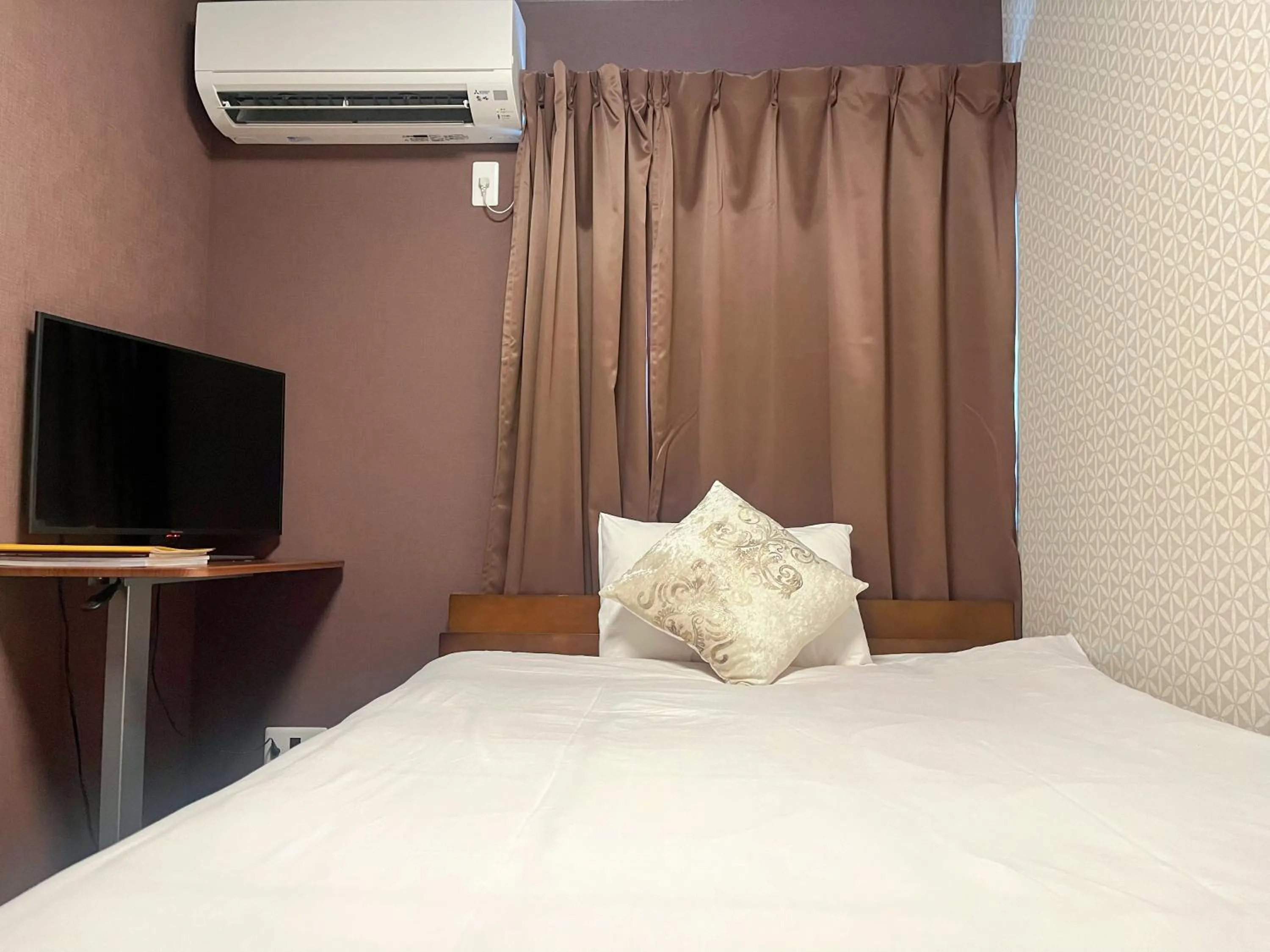 Bed in Miro Kyoto Nijo Hotel