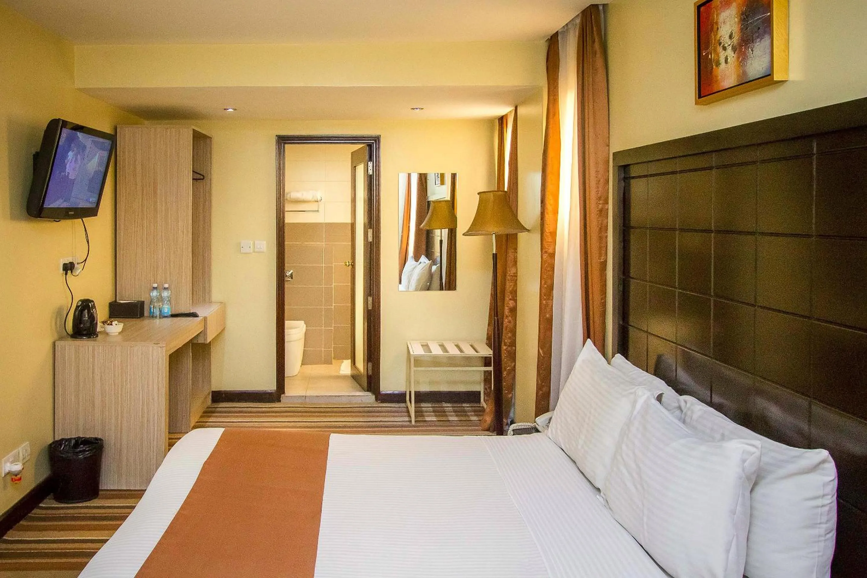 Bed in The Clarion Hotel