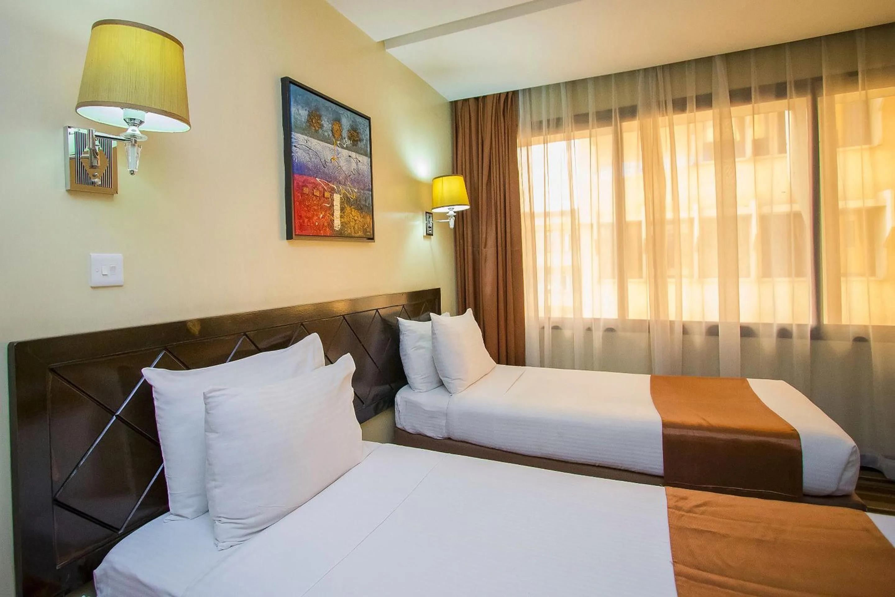 Bed in The Clarion Hotel