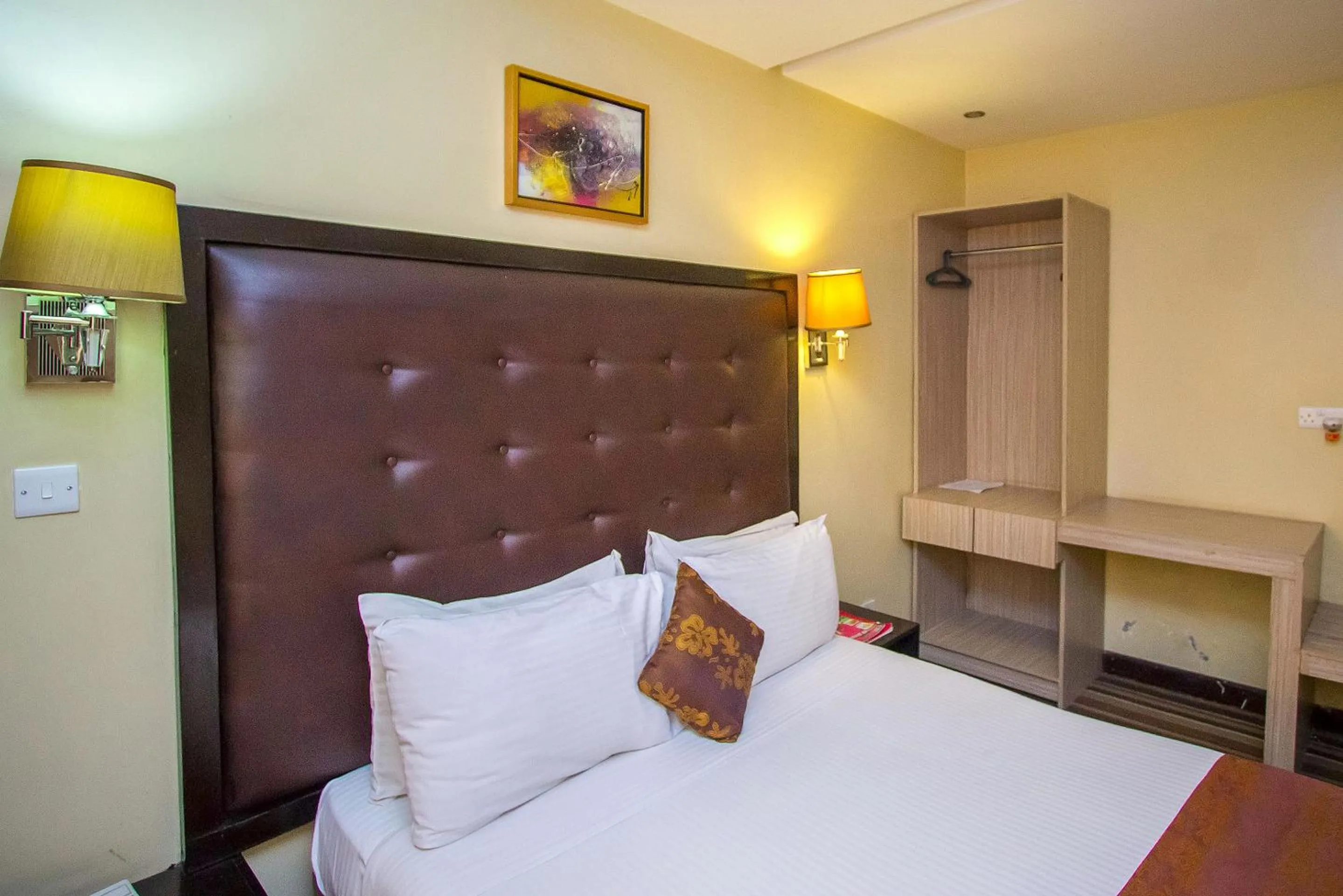 Bed in The Clarion Hotel