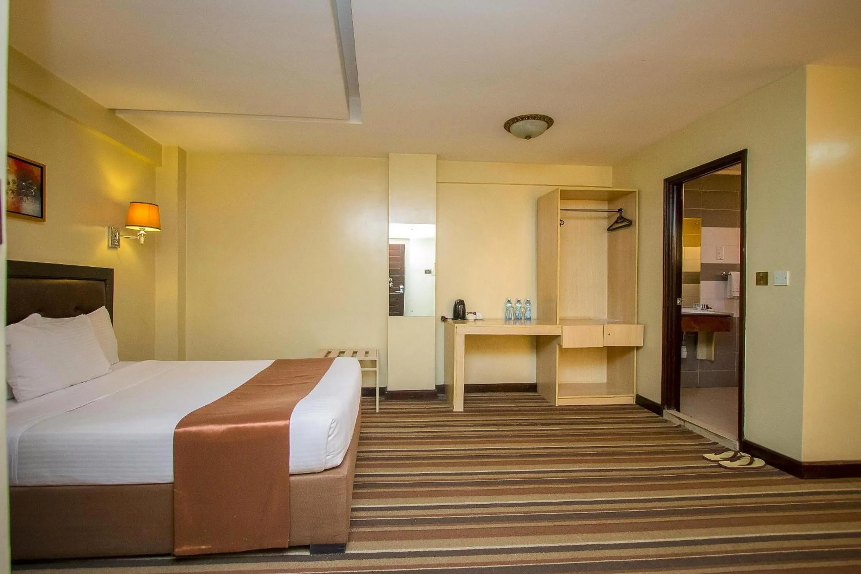 Bed in The Clarion Hotel