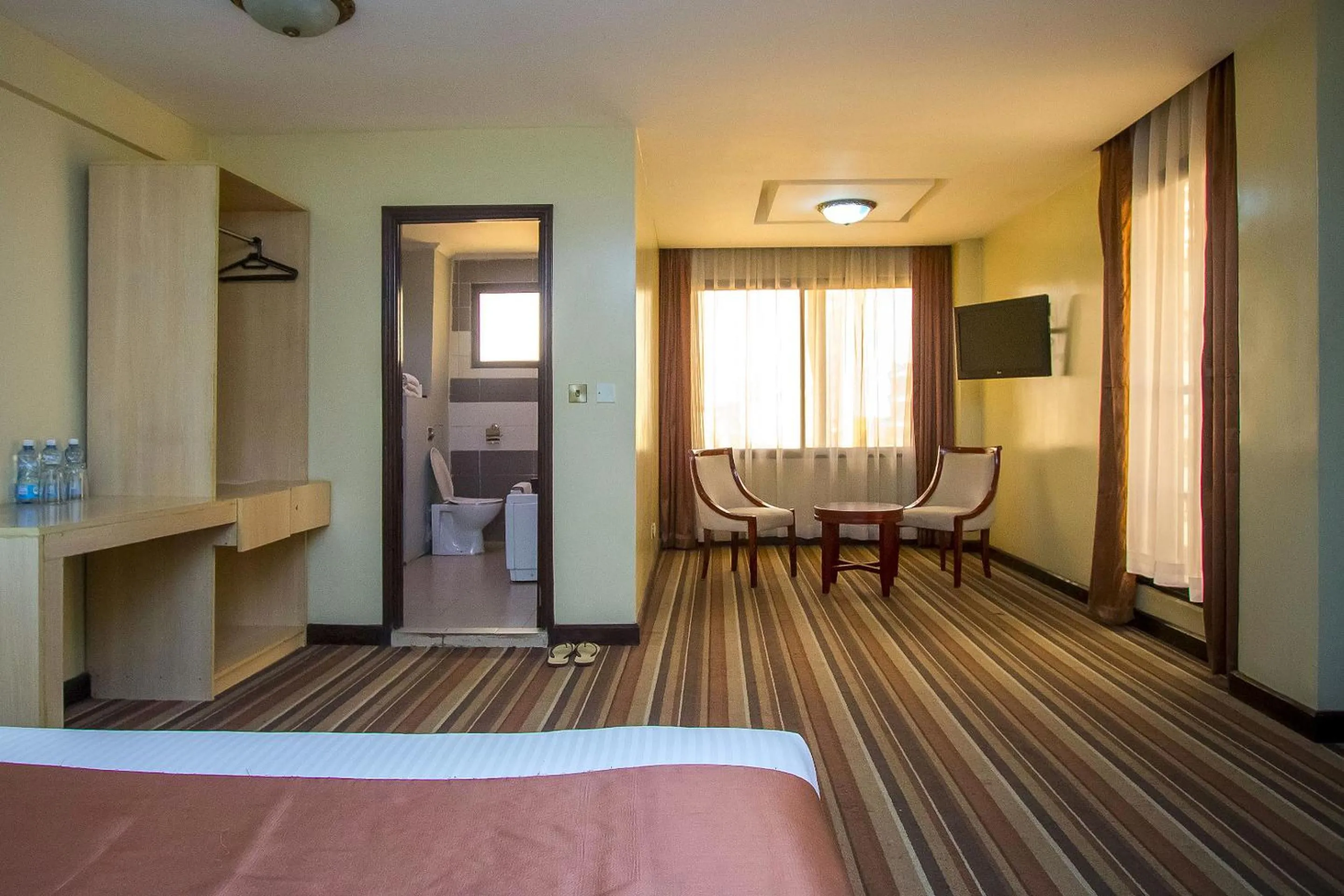 Bed in The Clarion Hotel