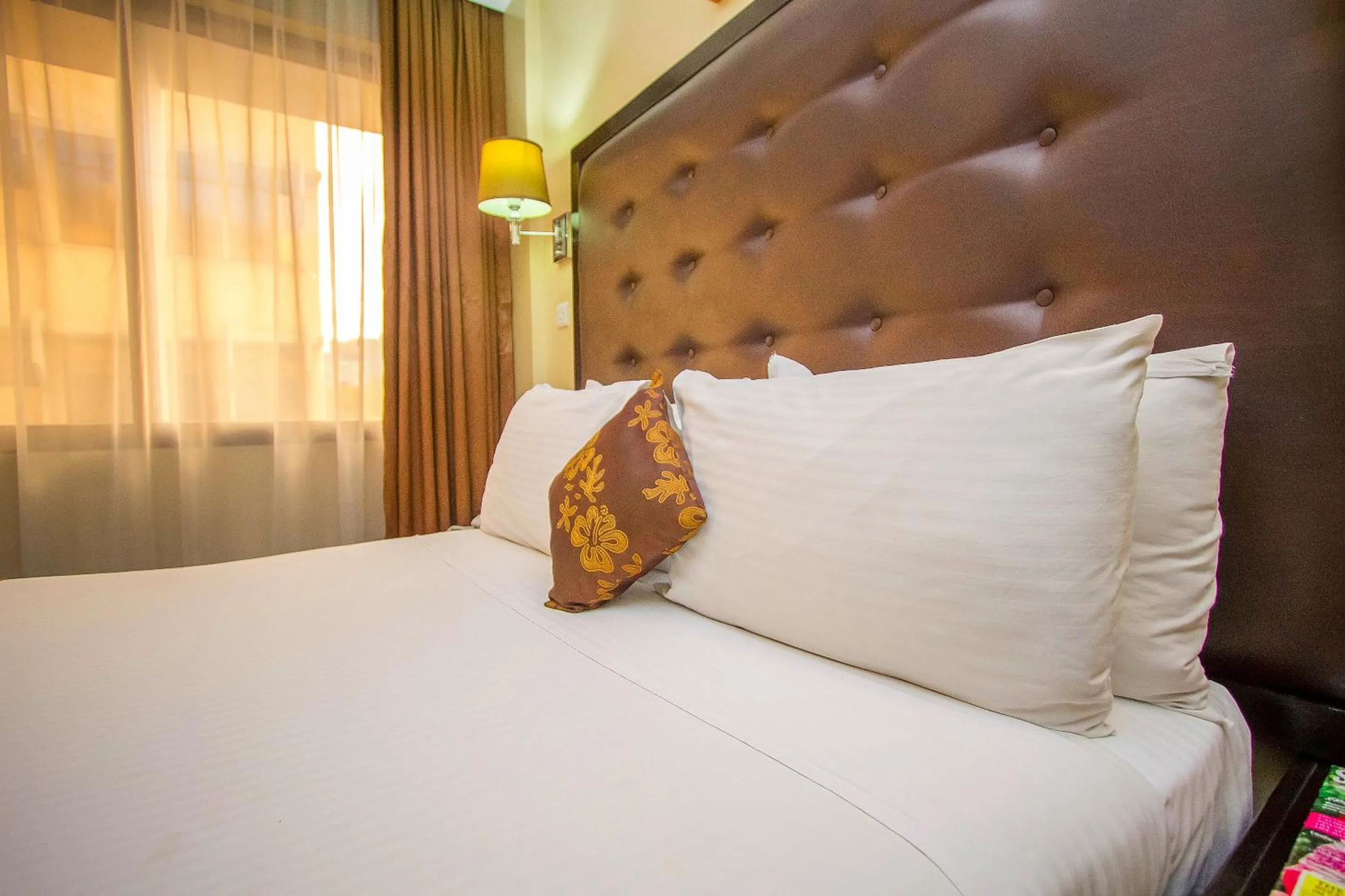 Bed in The Clarion Hotel