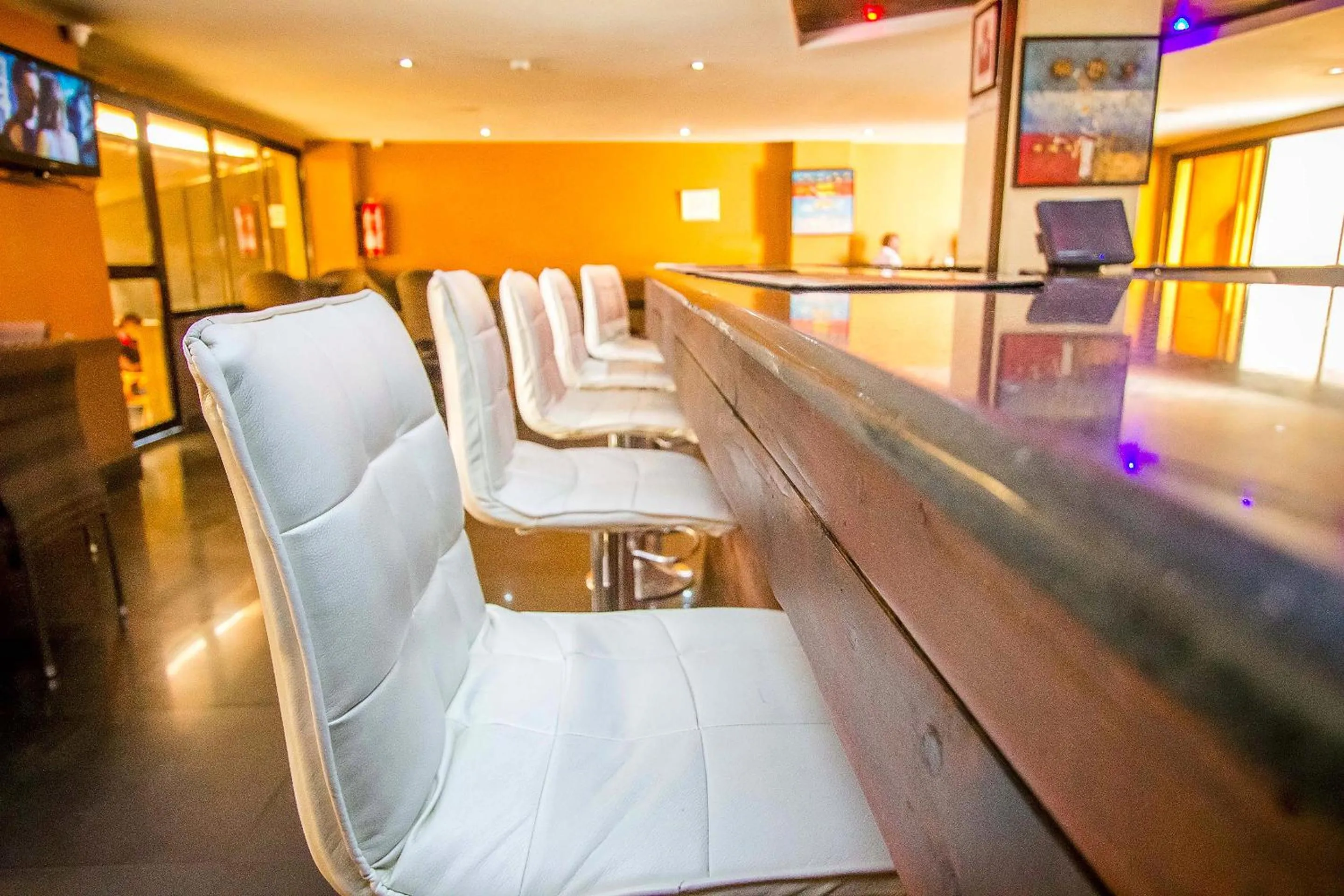 Communal lounge/ TV room in The Clarion Hotel