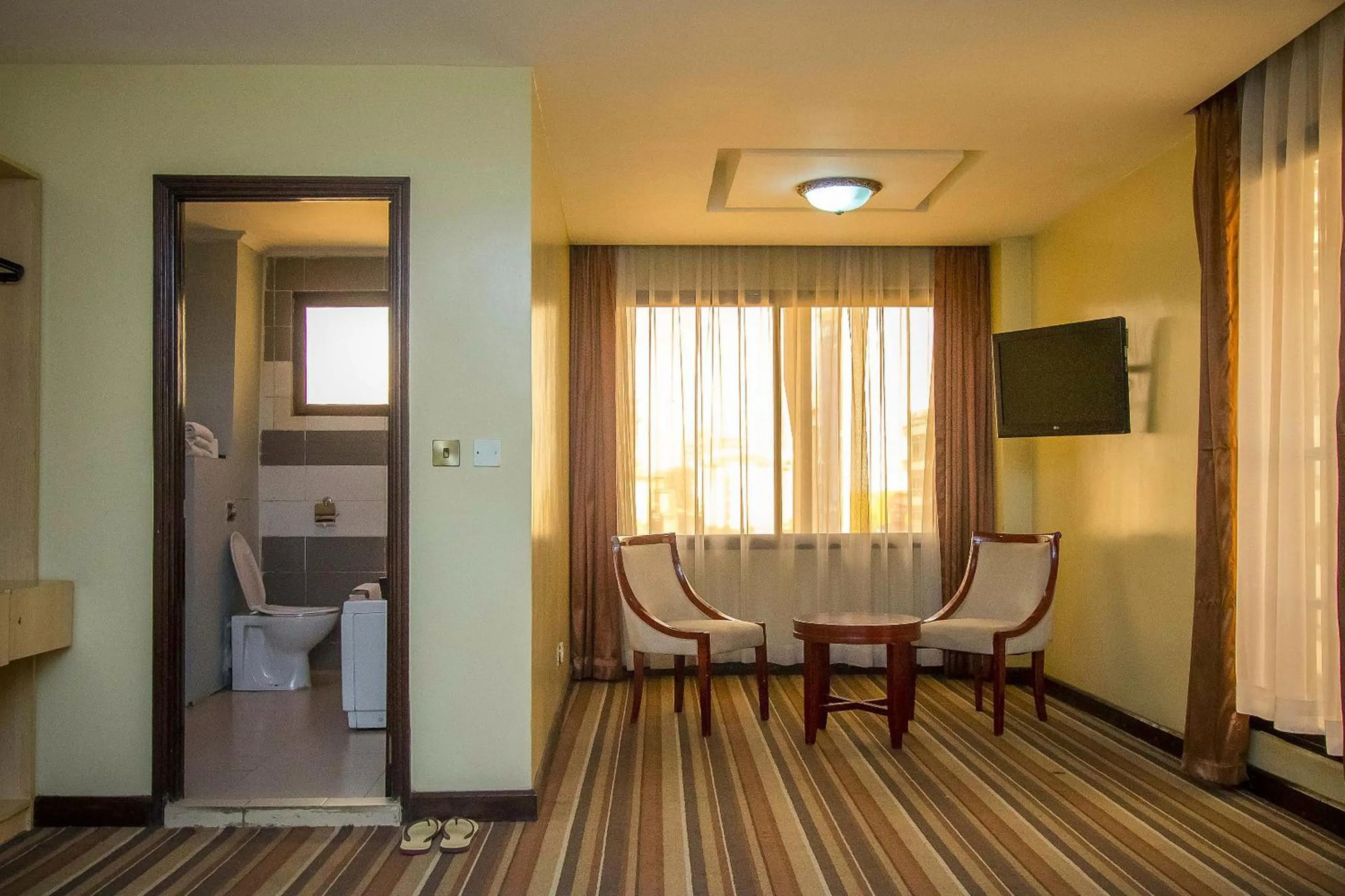 Bedroom, Bed in The Clarion Hotel