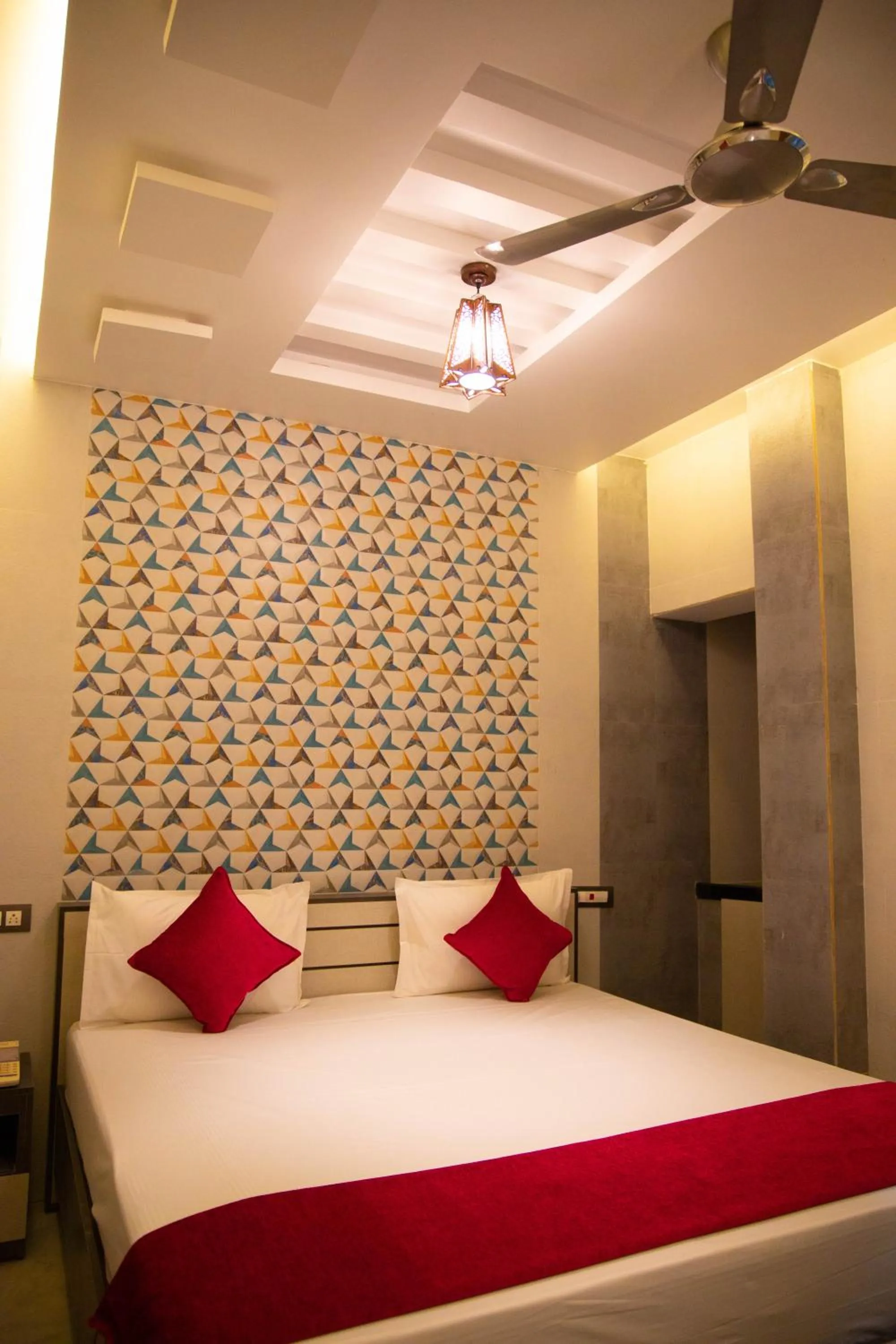 Bed in Hotel Ganesh Palace