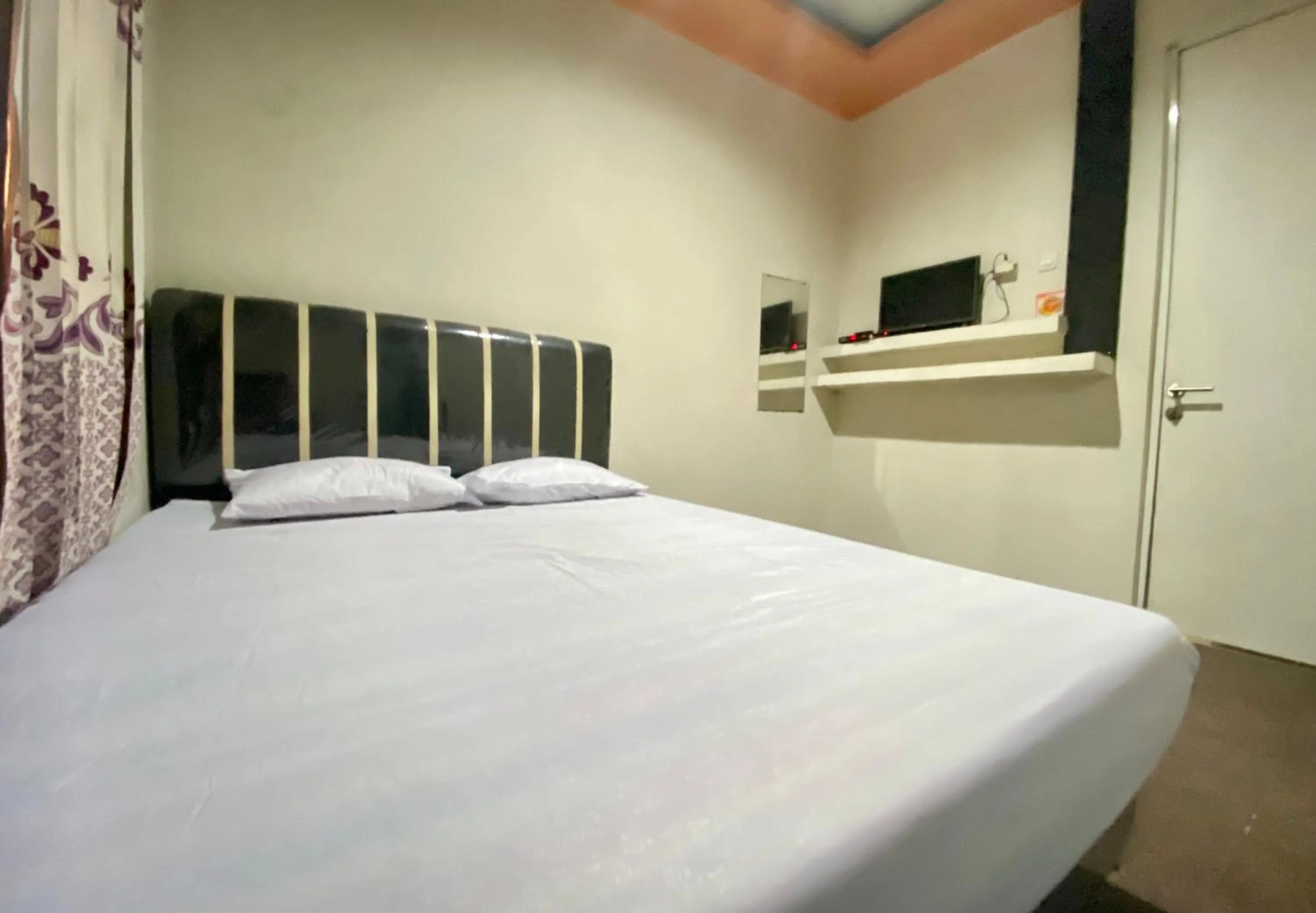 Bed in Homestay Srikandi Syariah Dieng RedPartner