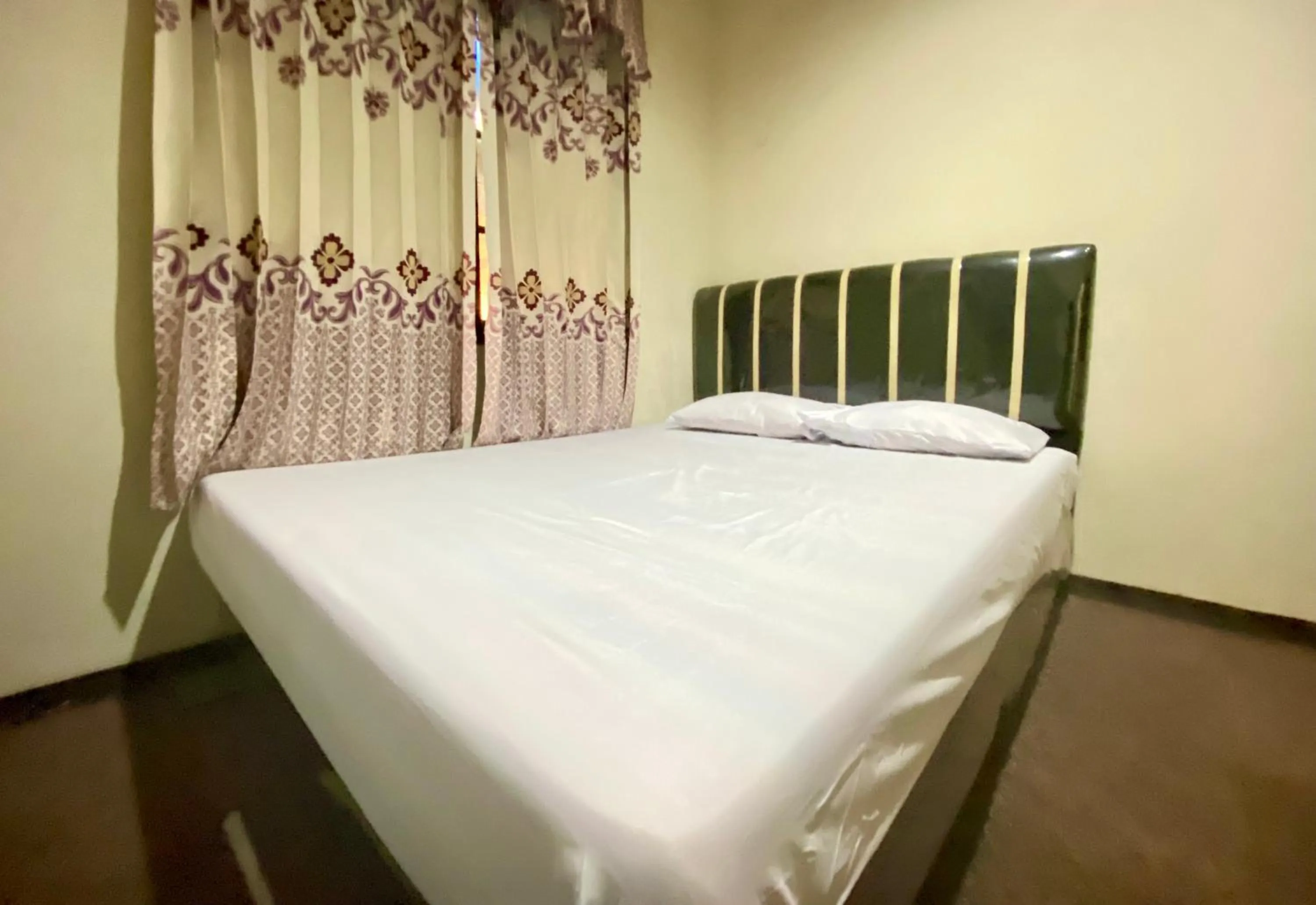 Bed in Homestay Srikandi Syariah Dieng RedPartner