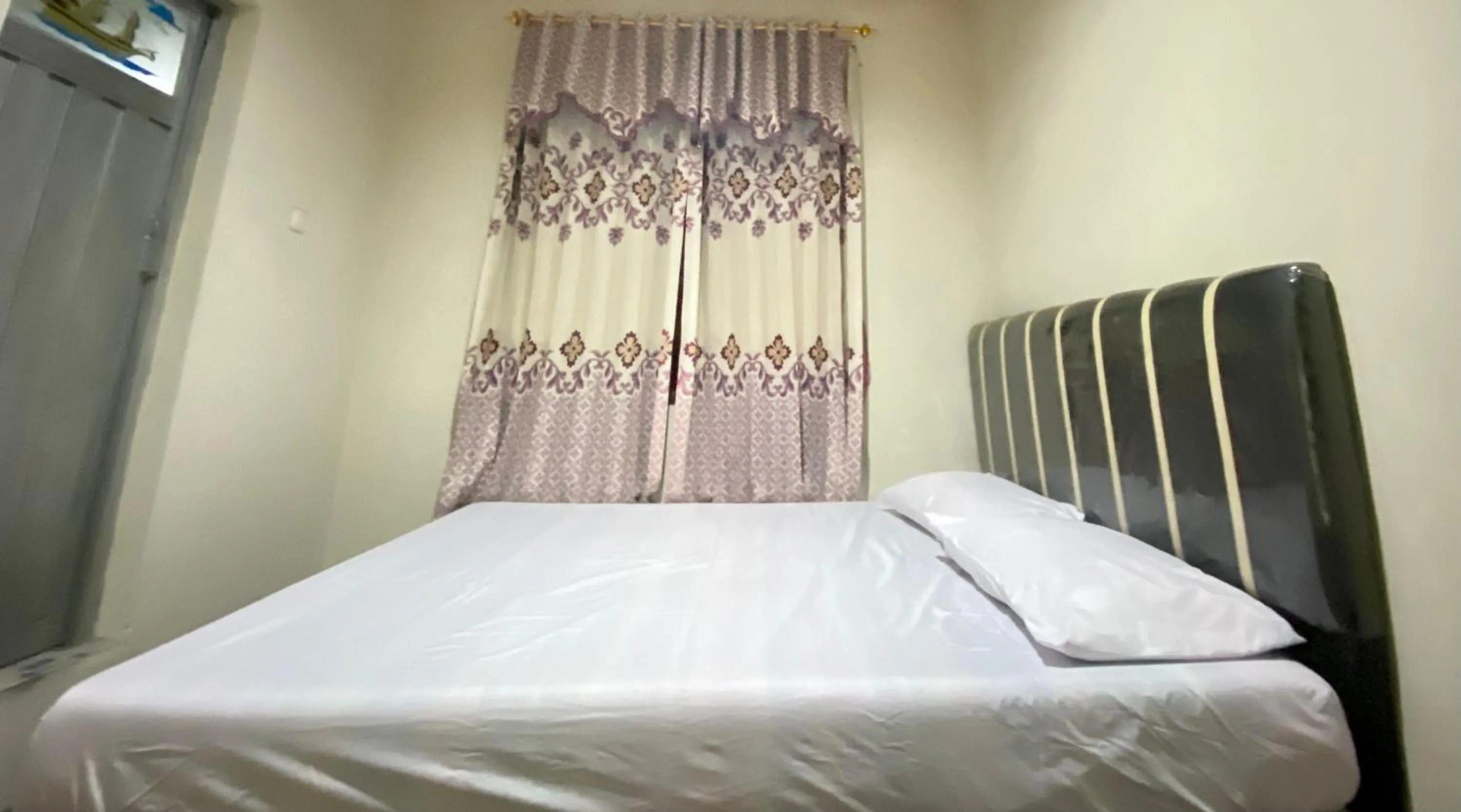 Bed in Homestay Srikandi Syariah Dieng RedPartner