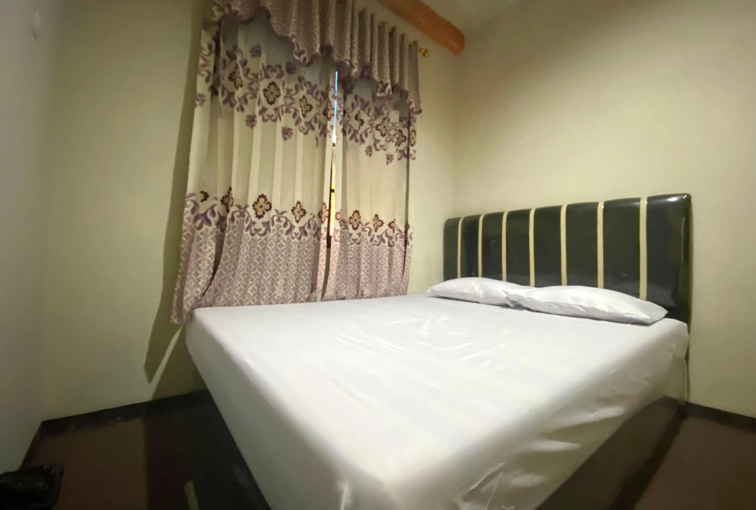 Bed in Homestay Srikandi Syariah Dieng RedPartner