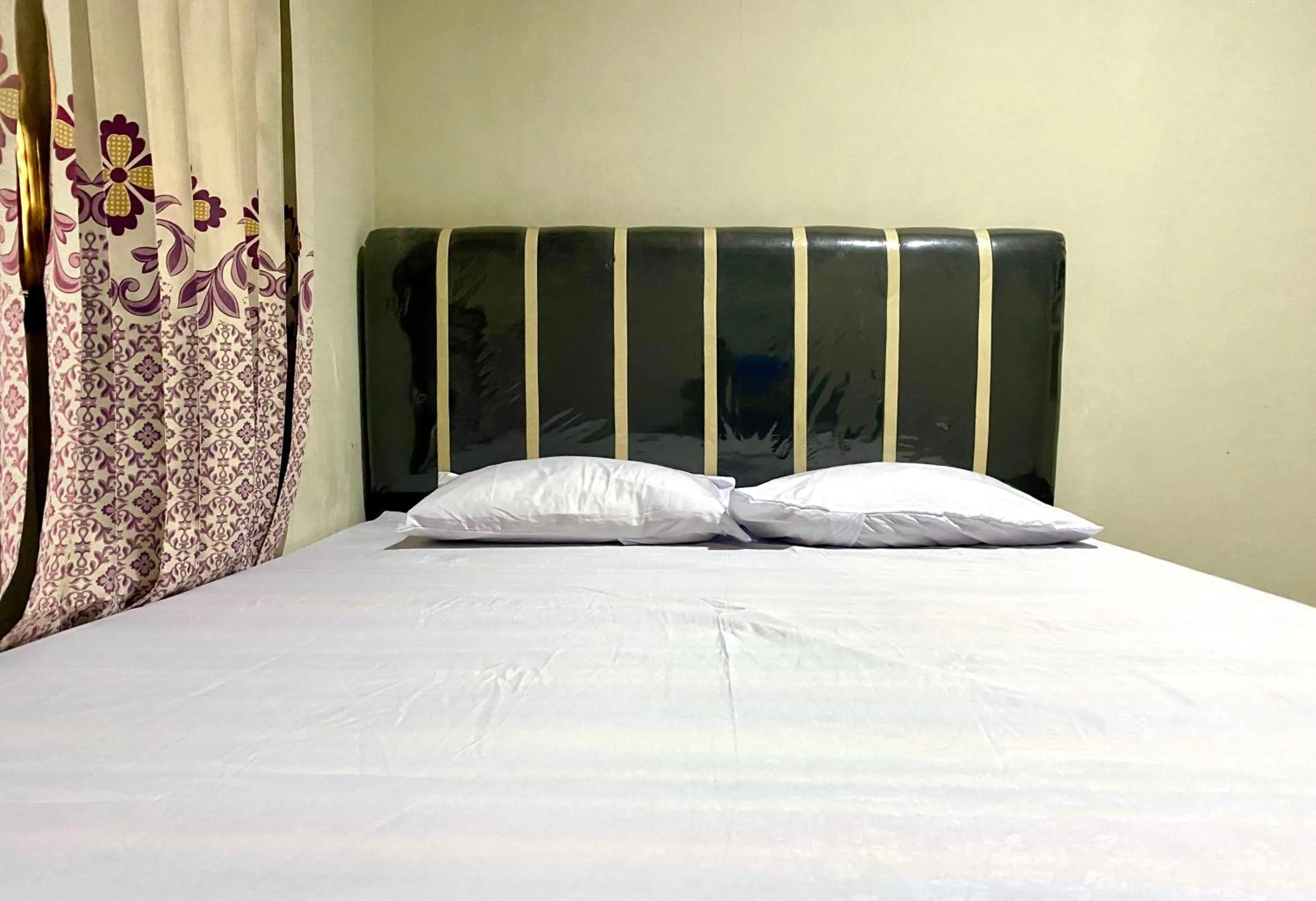 Bed in Homestay Srikandi Syariah Dieng RedPartner