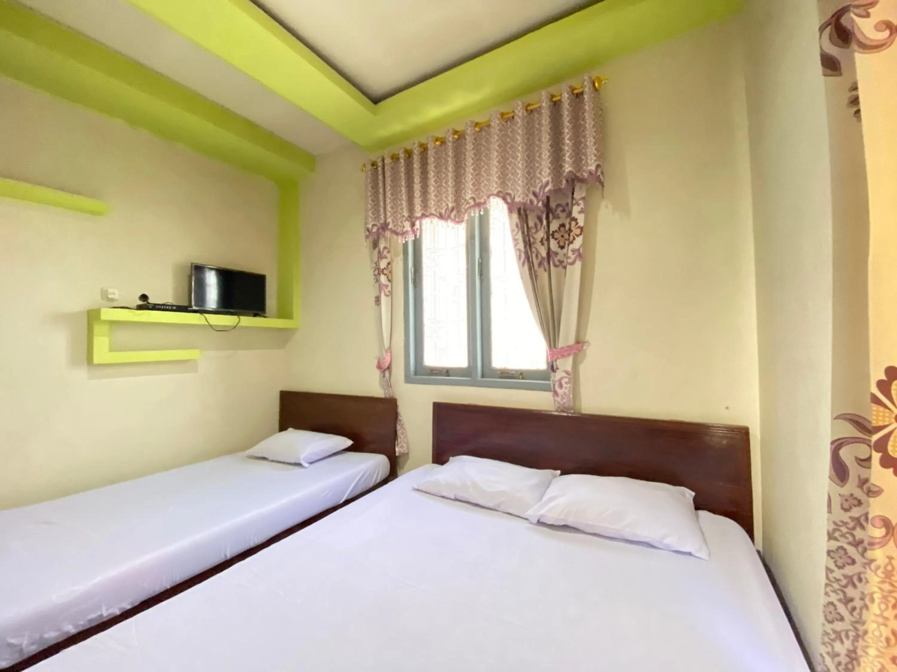 Bed in Homestay Srikandi Syariah Dieng RedPartner