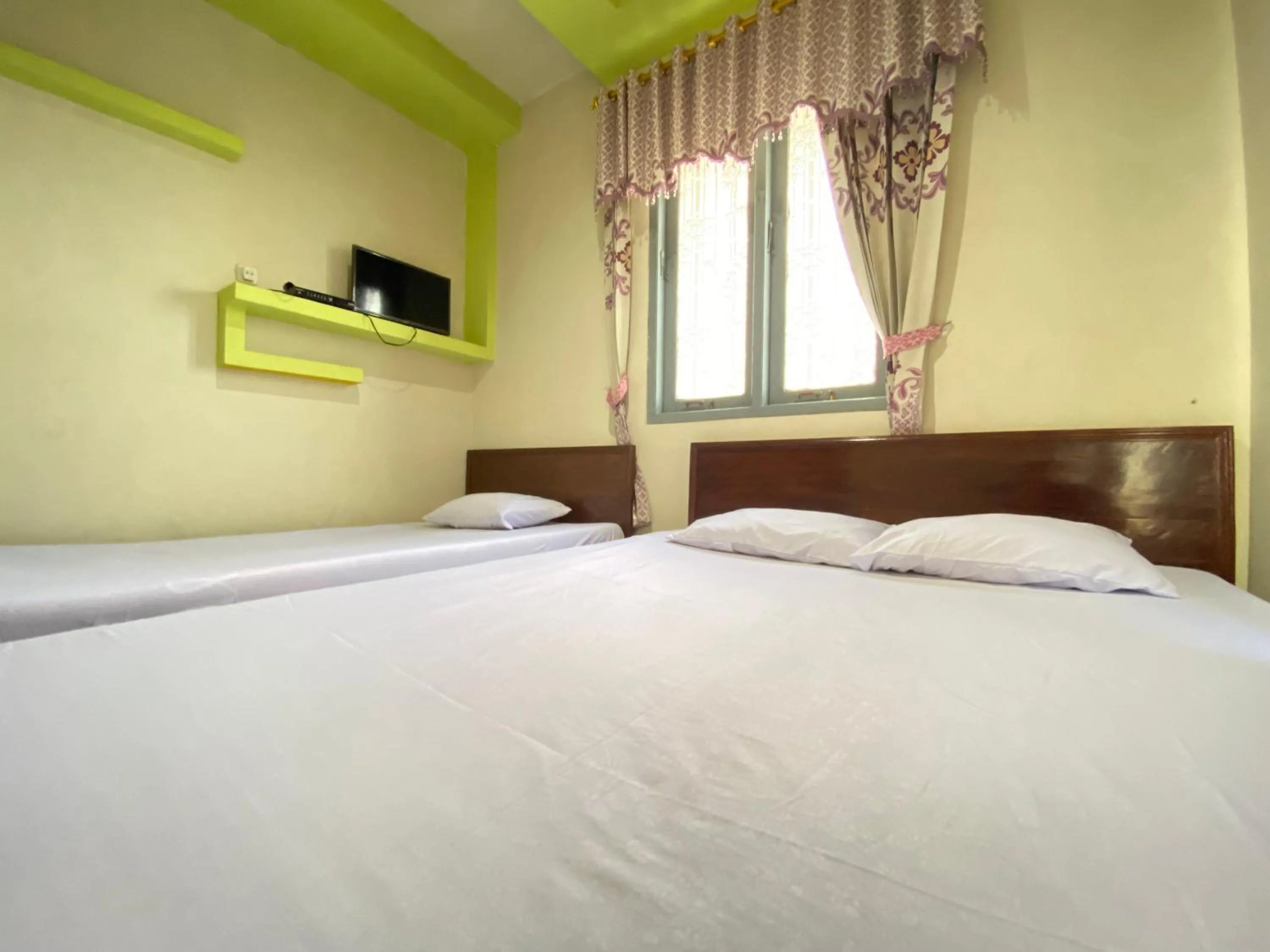 Bed in Homestay Srikandi Syariah Dieng RedPartner