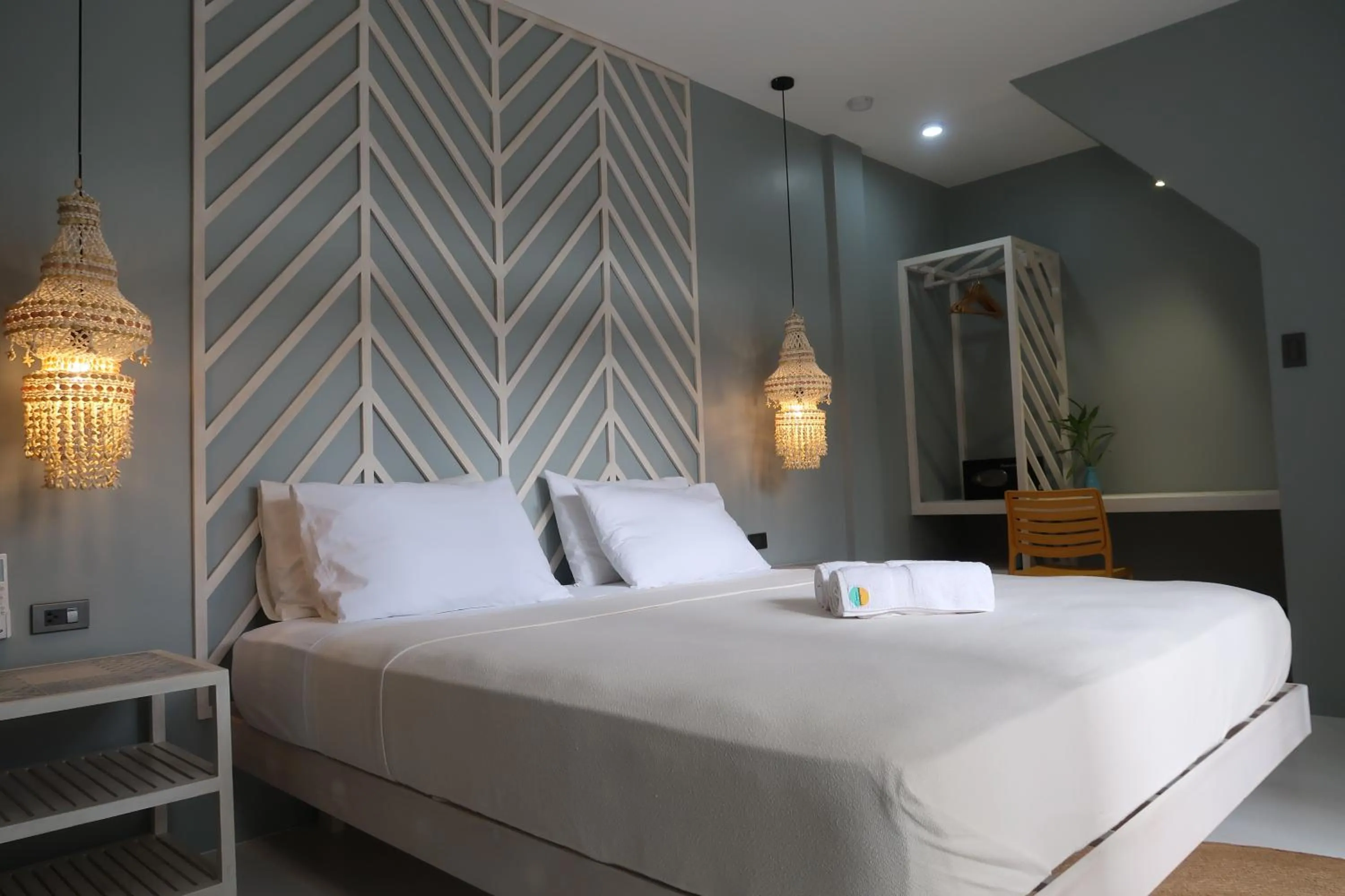 Bed in MUNI MUNI VILLAS SIARGAO