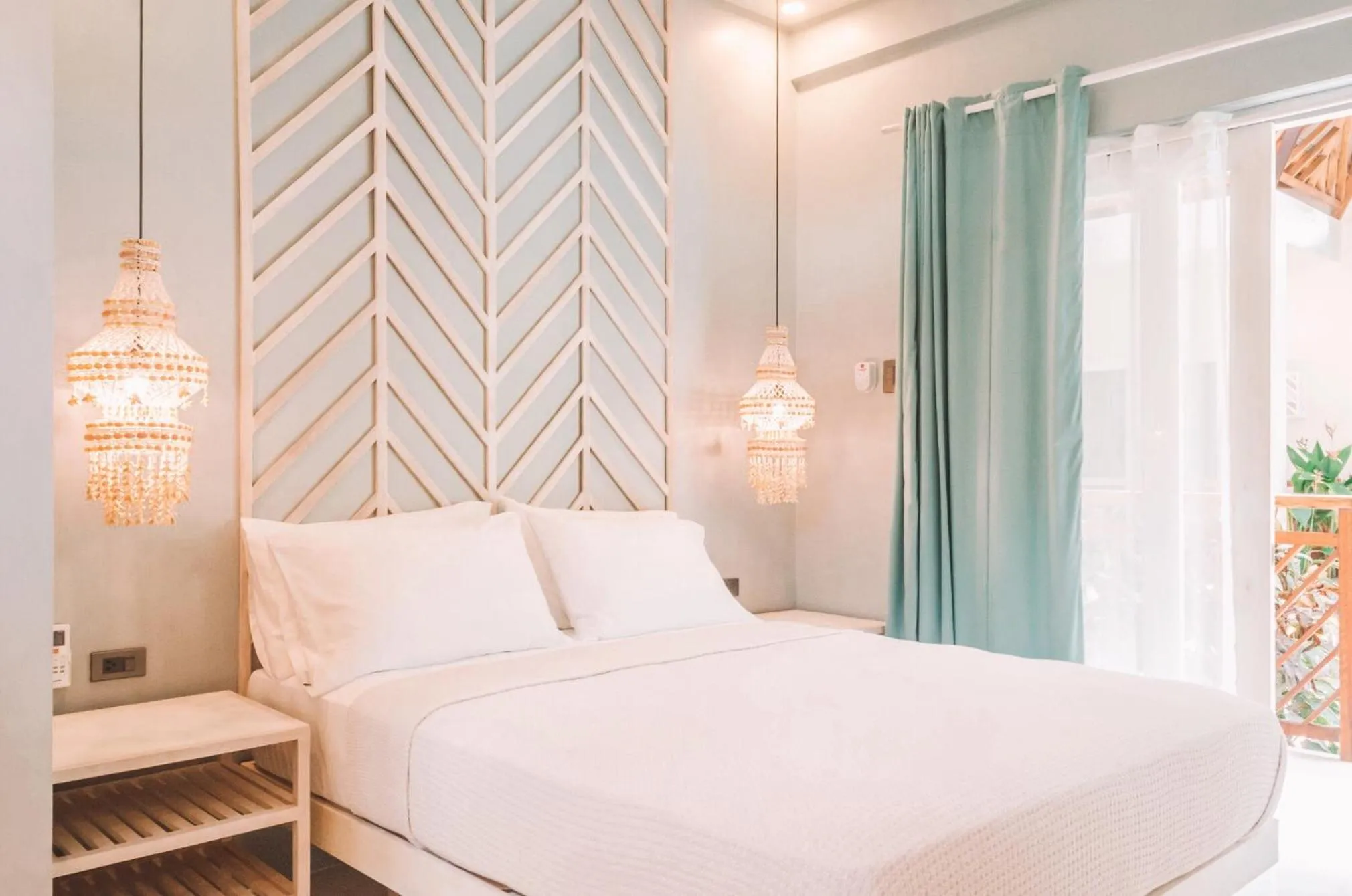 Bed in MUNI MUNI VILLAS SIARGAO