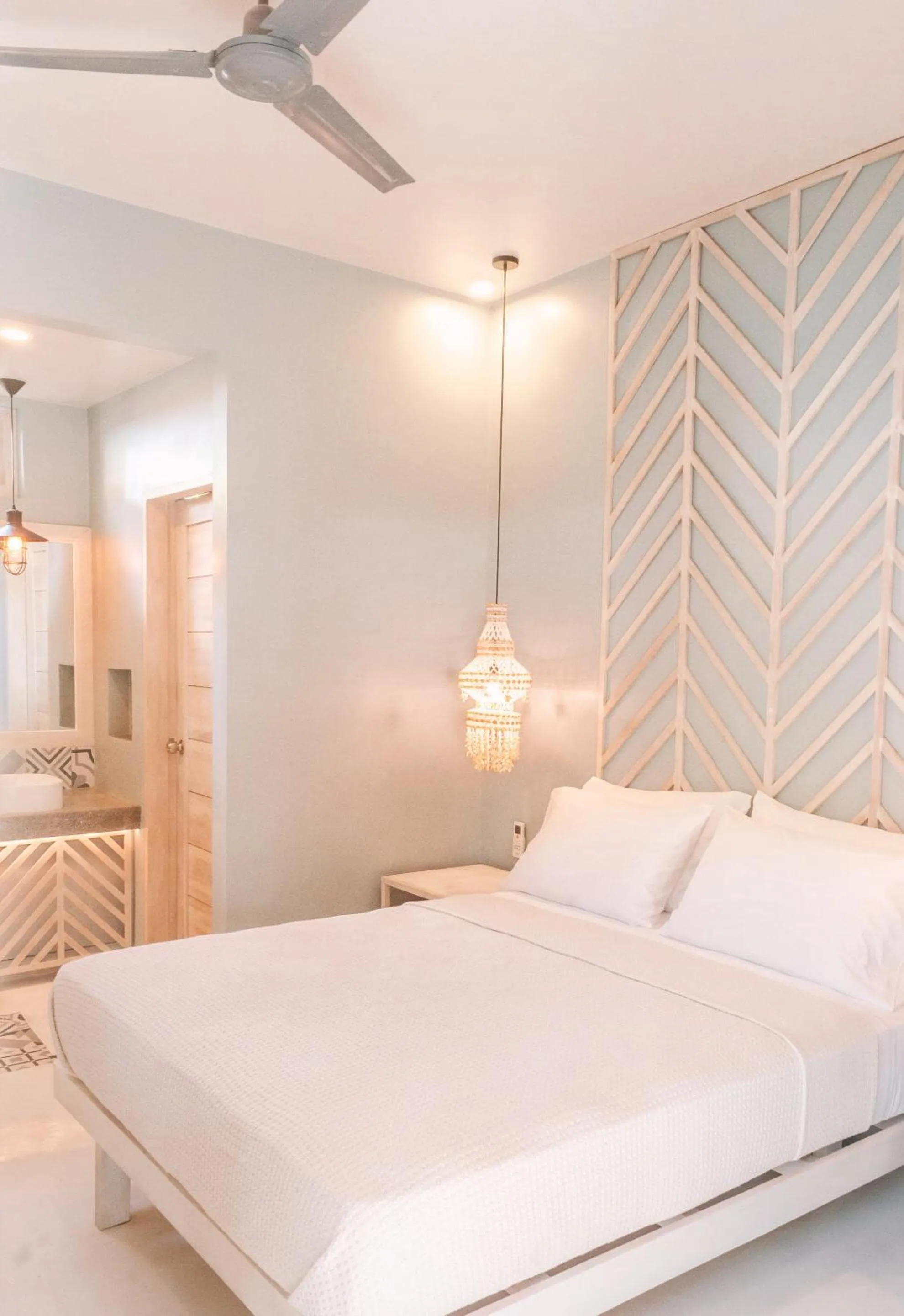 Bed in MUNI MUNI VILLAS SIARGAO