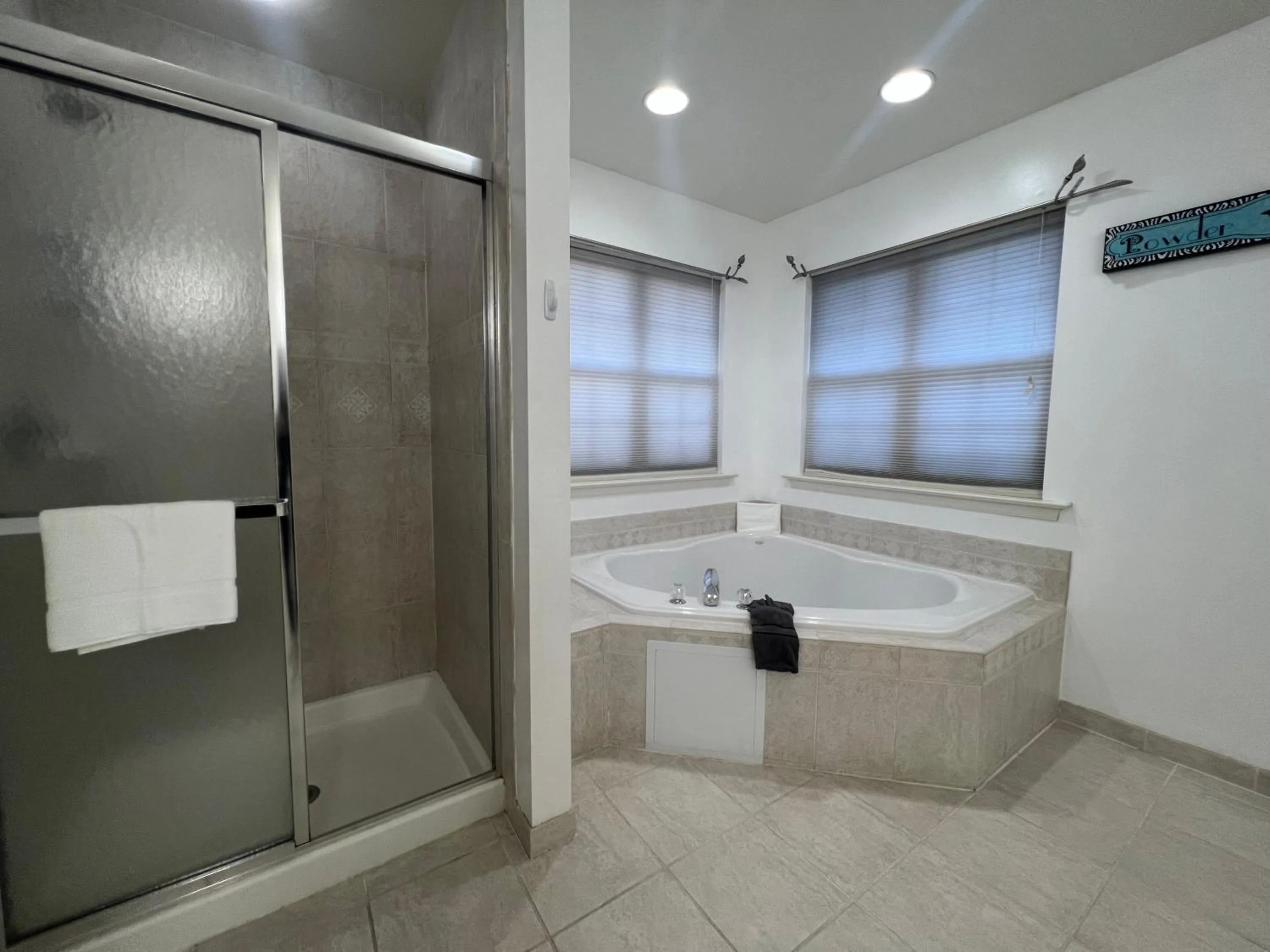 Bathroom in Luxury Villa with Hot Tub, Two Fire Pits, King Bed Suite, Game Room & Fenced Yard