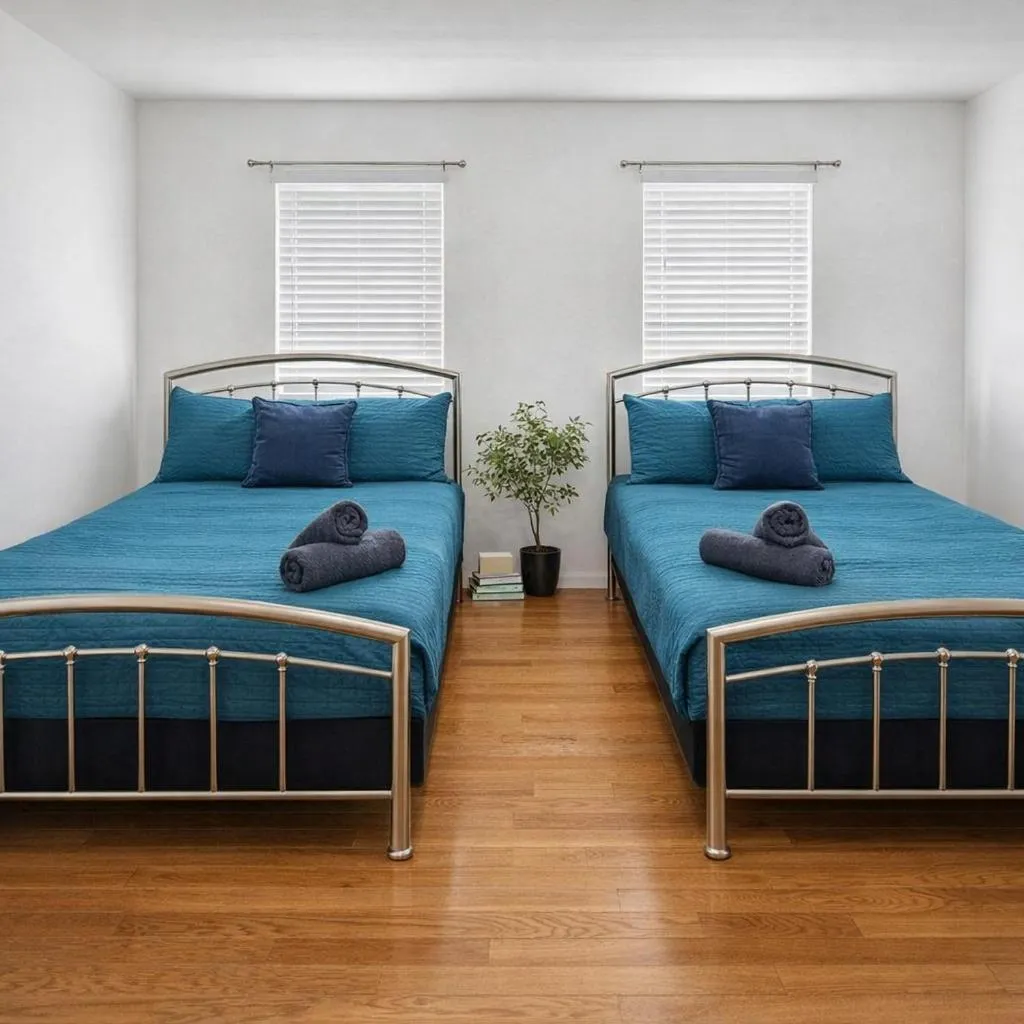 Bed in Luxury Villa with Hot Tub, Two Fire Pits, King Bed Suite, Game Room & Fenced Yard