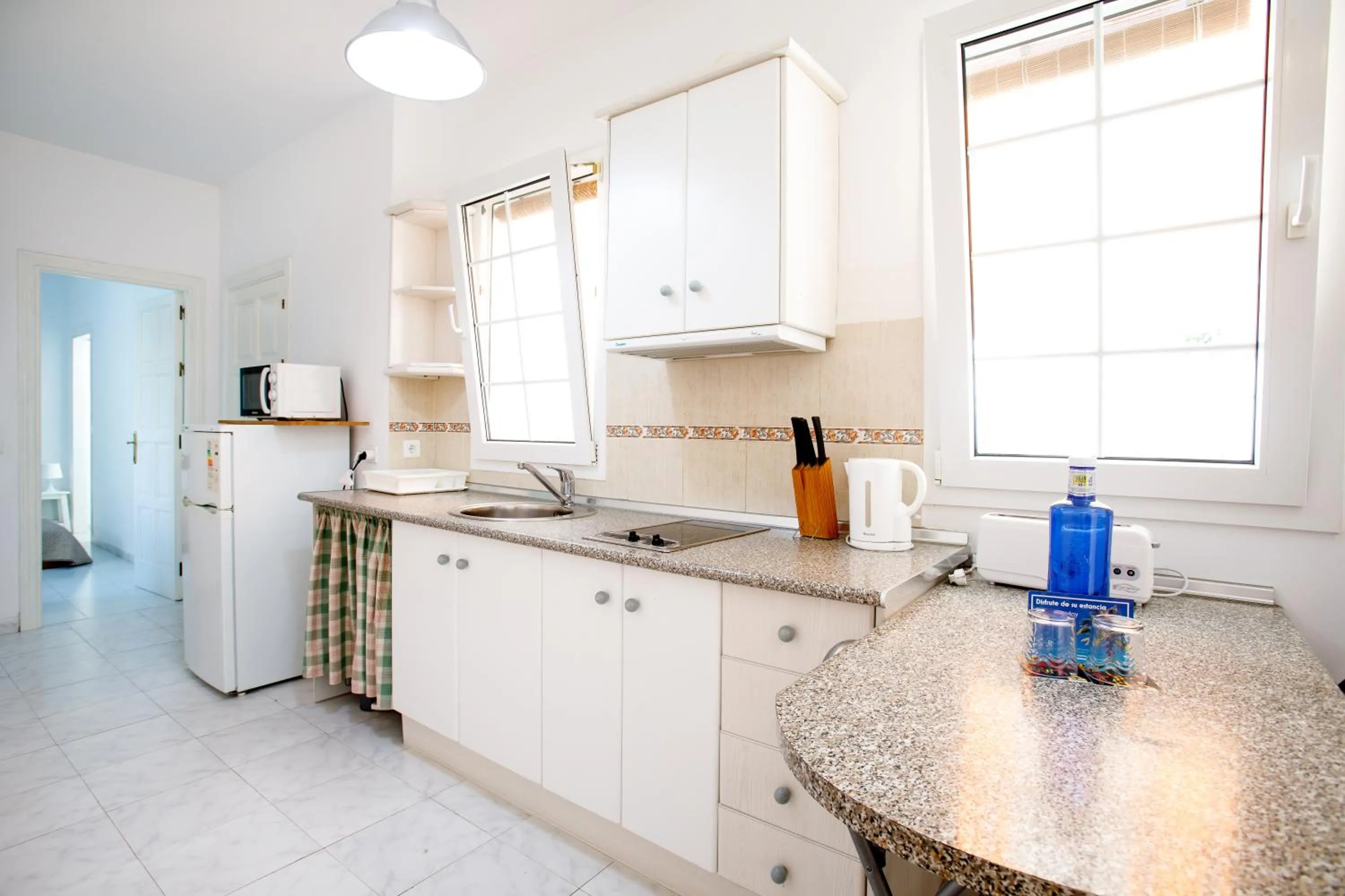 Kitchen or kitchenette in AT Almoraide Rooms Suites