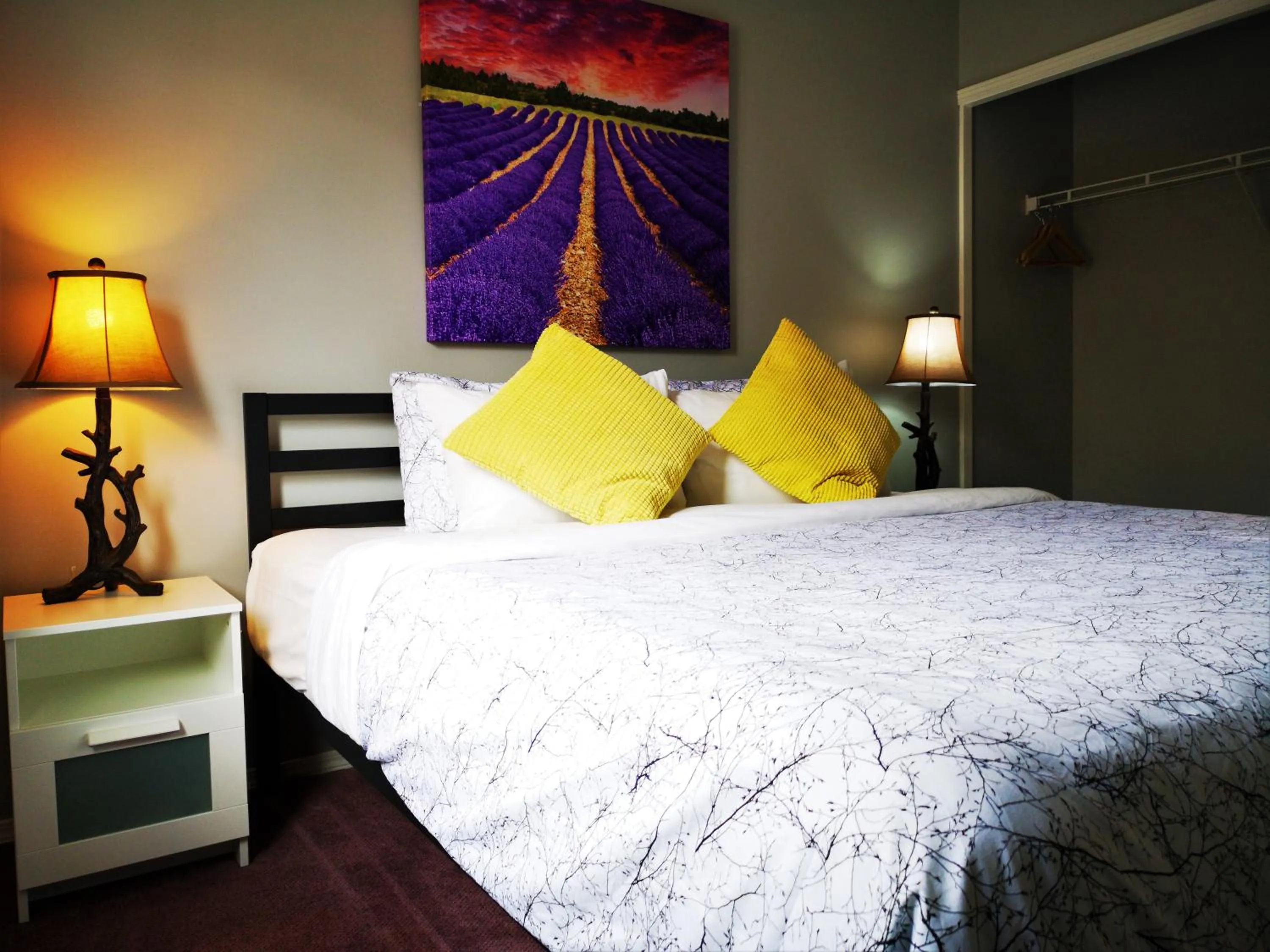 Bedroom, Bed in Canadian Rockies Chalets by Trilink - 2 & 3 Bedroom Condos - Self Check-In - Walking Distance to Downtown - Free Parking - Pet-Friendly - No AC