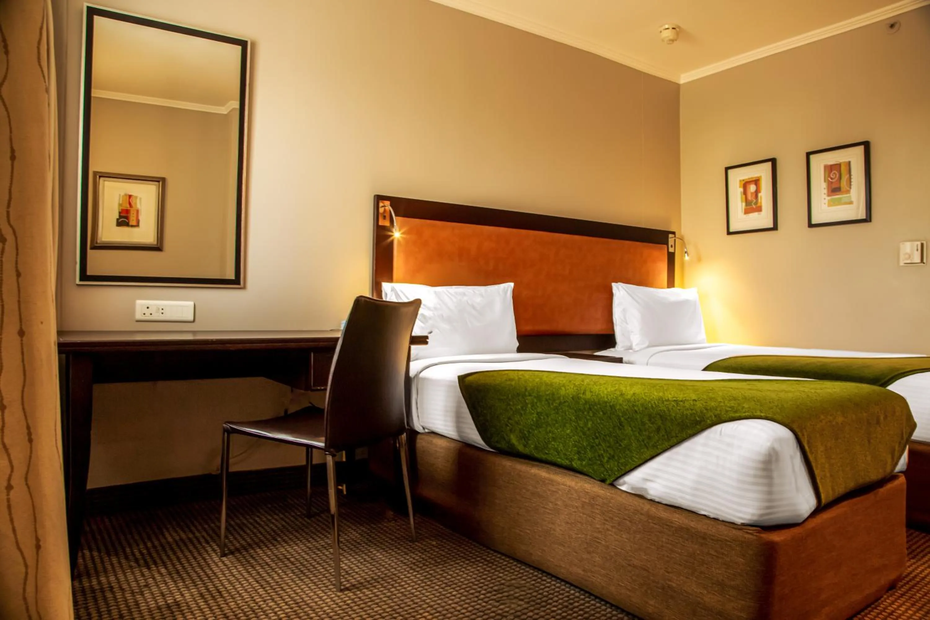 Bed in The RidgePoint Hotel