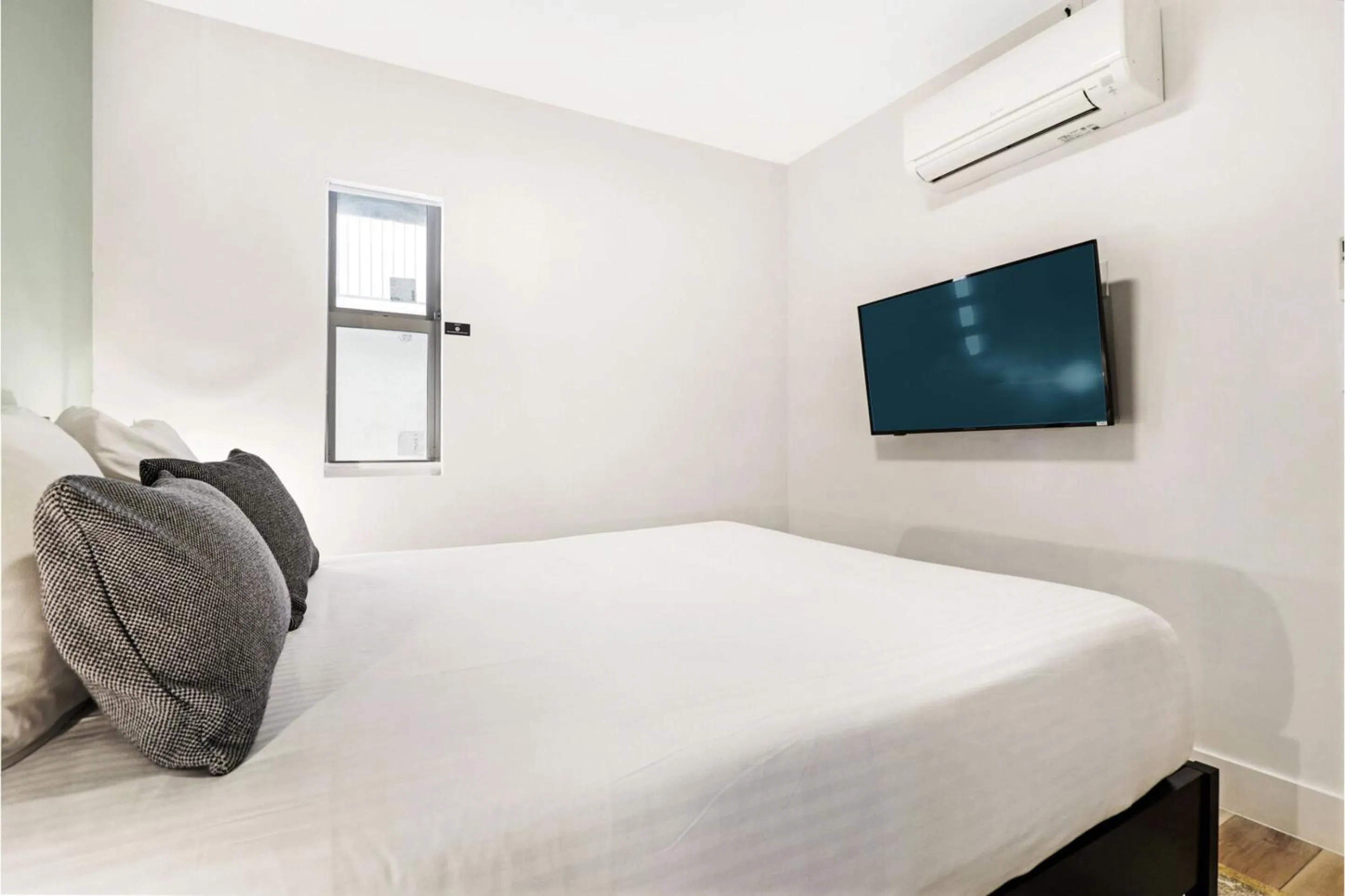 Bed in Roami at The Carmela