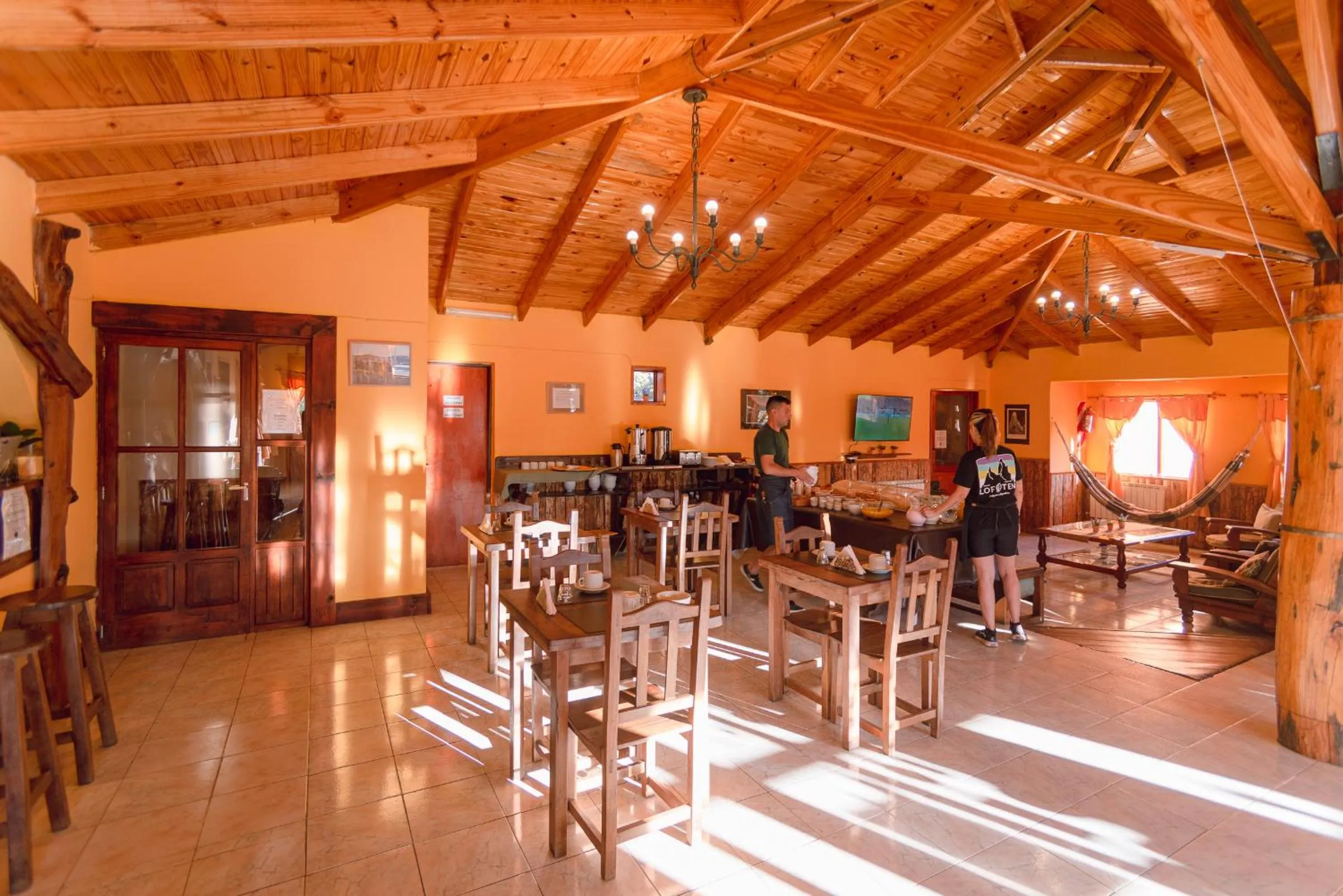 Communal lounge/ TV room in Hosteria LOS ÑIRES