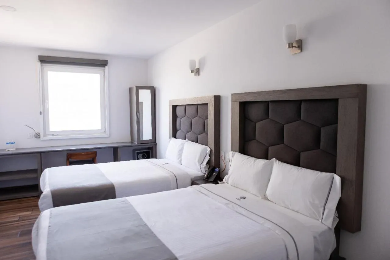 Bed in Hotel Bugari Aeropuerto Guadalajara