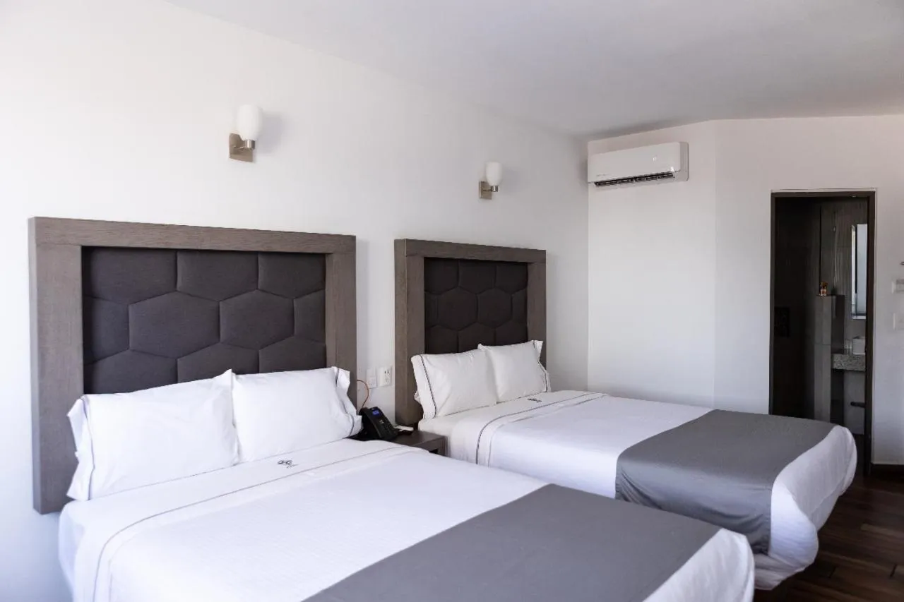 Bed in Hotel Bugari Aeropuerto Guadalajara