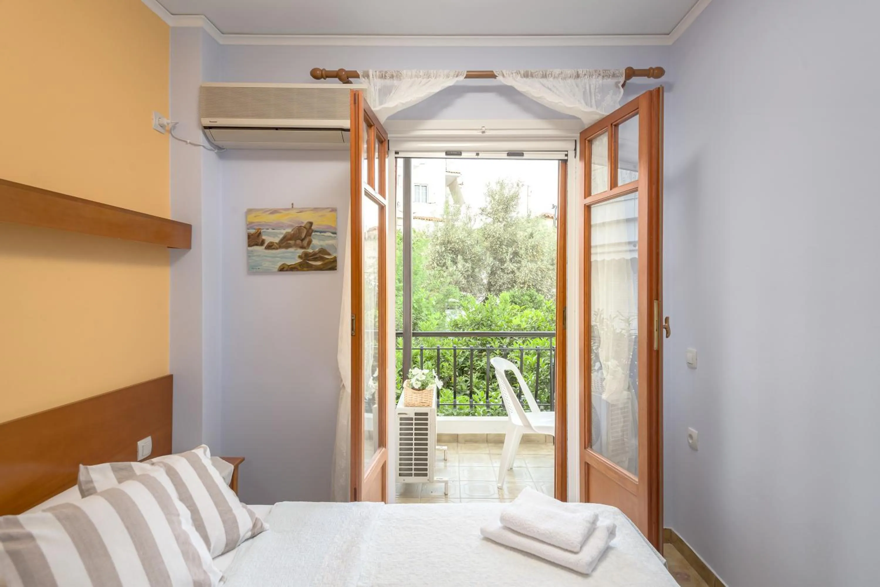 Bed in Oasis Apartments