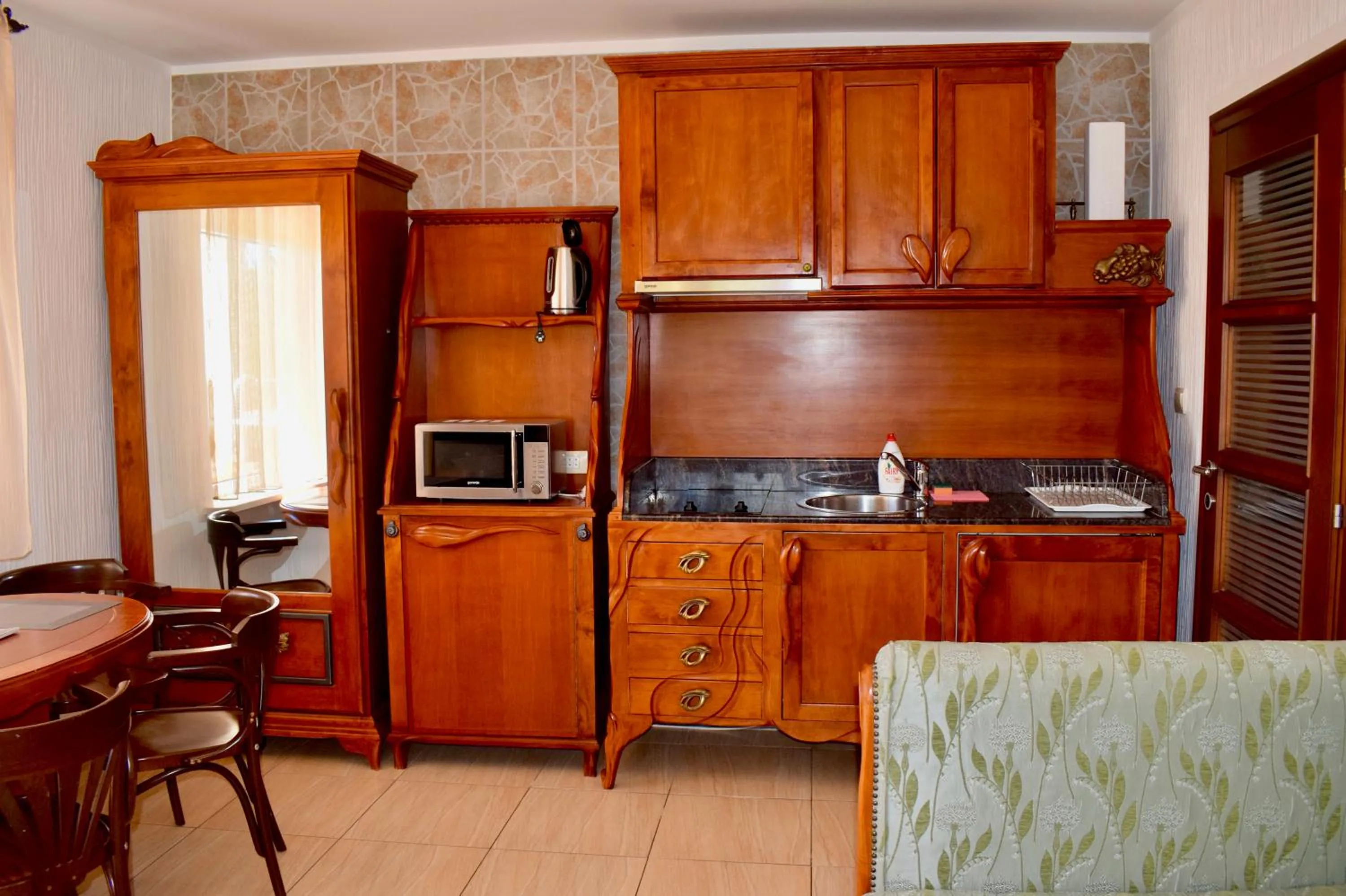 Kitchen or kitchenette in Villa Dolphin Apartments