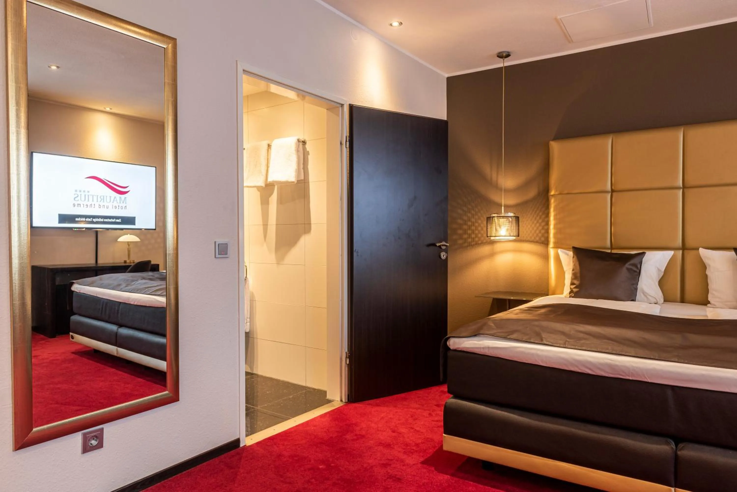 Photo of the whole room, Bed in Mauritius Hotel & Therme